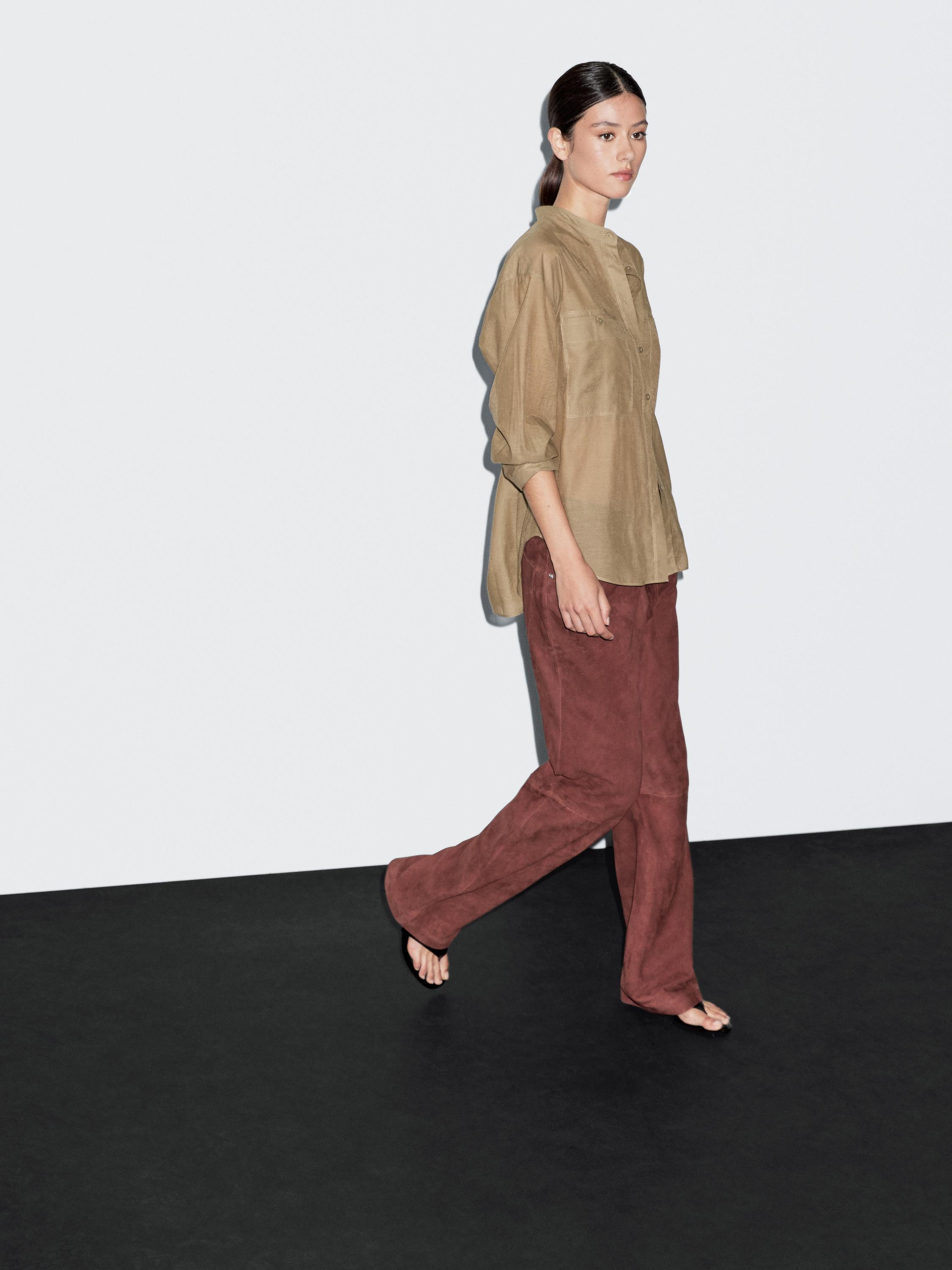Long shirt with stand collar