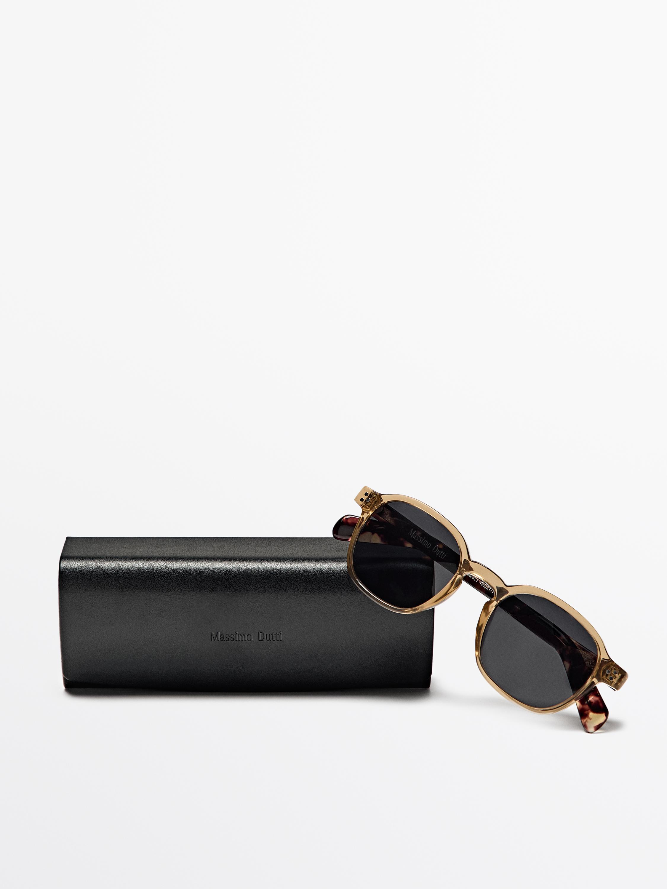 Round tortoiseshell-effect sunglasses