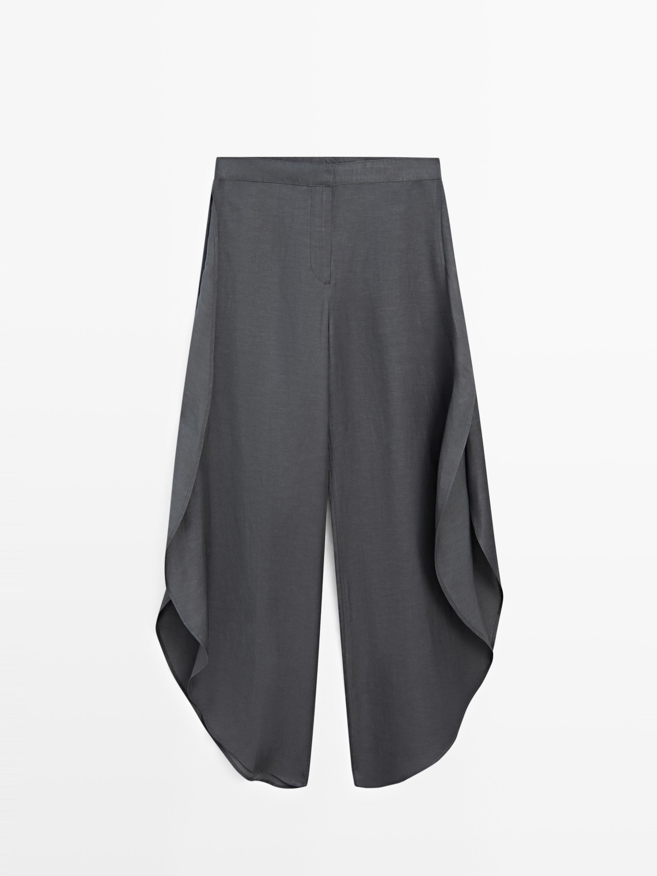 Pantalón detalle aberturas con lino