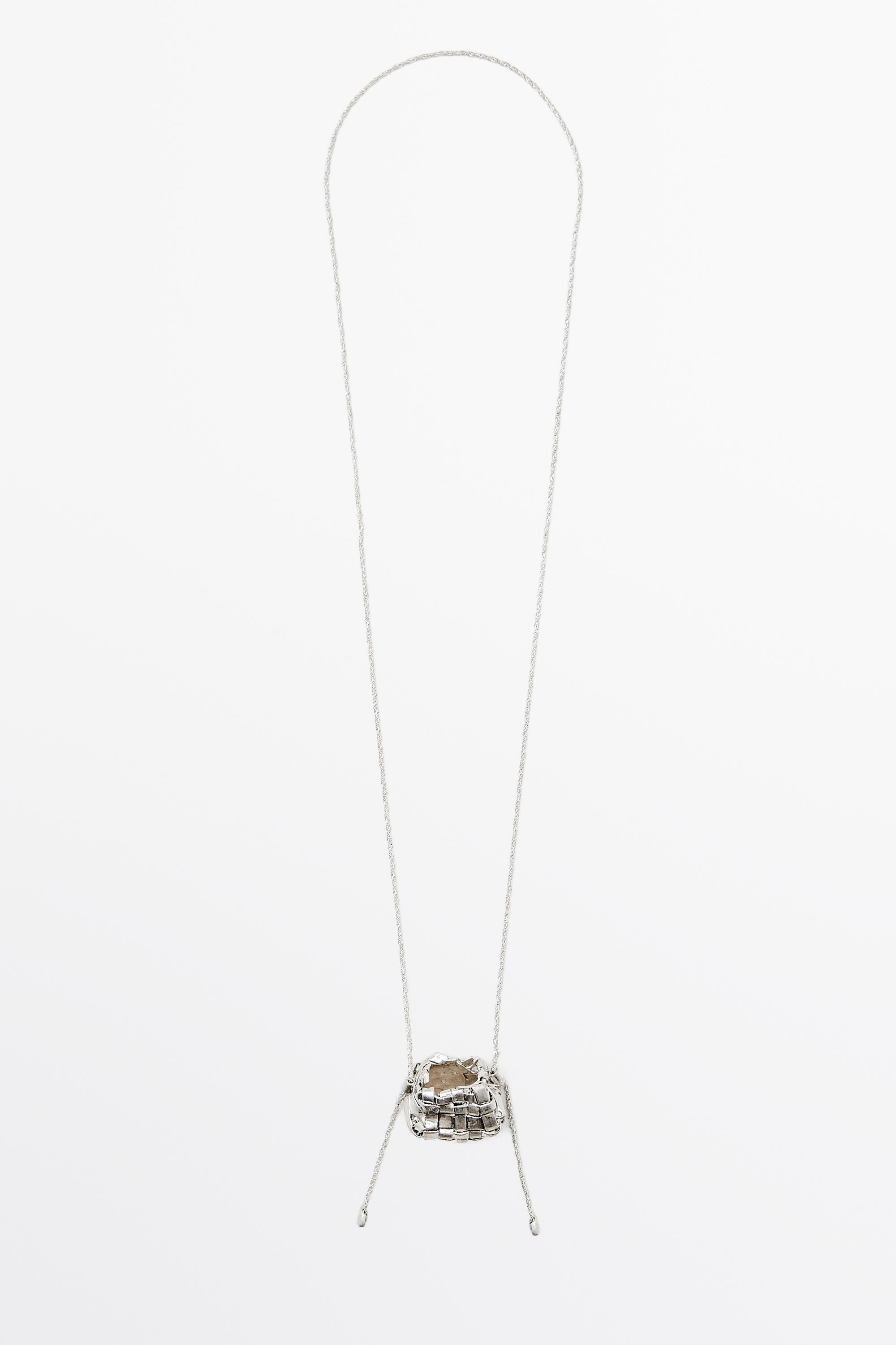 Long necklace with basket piece