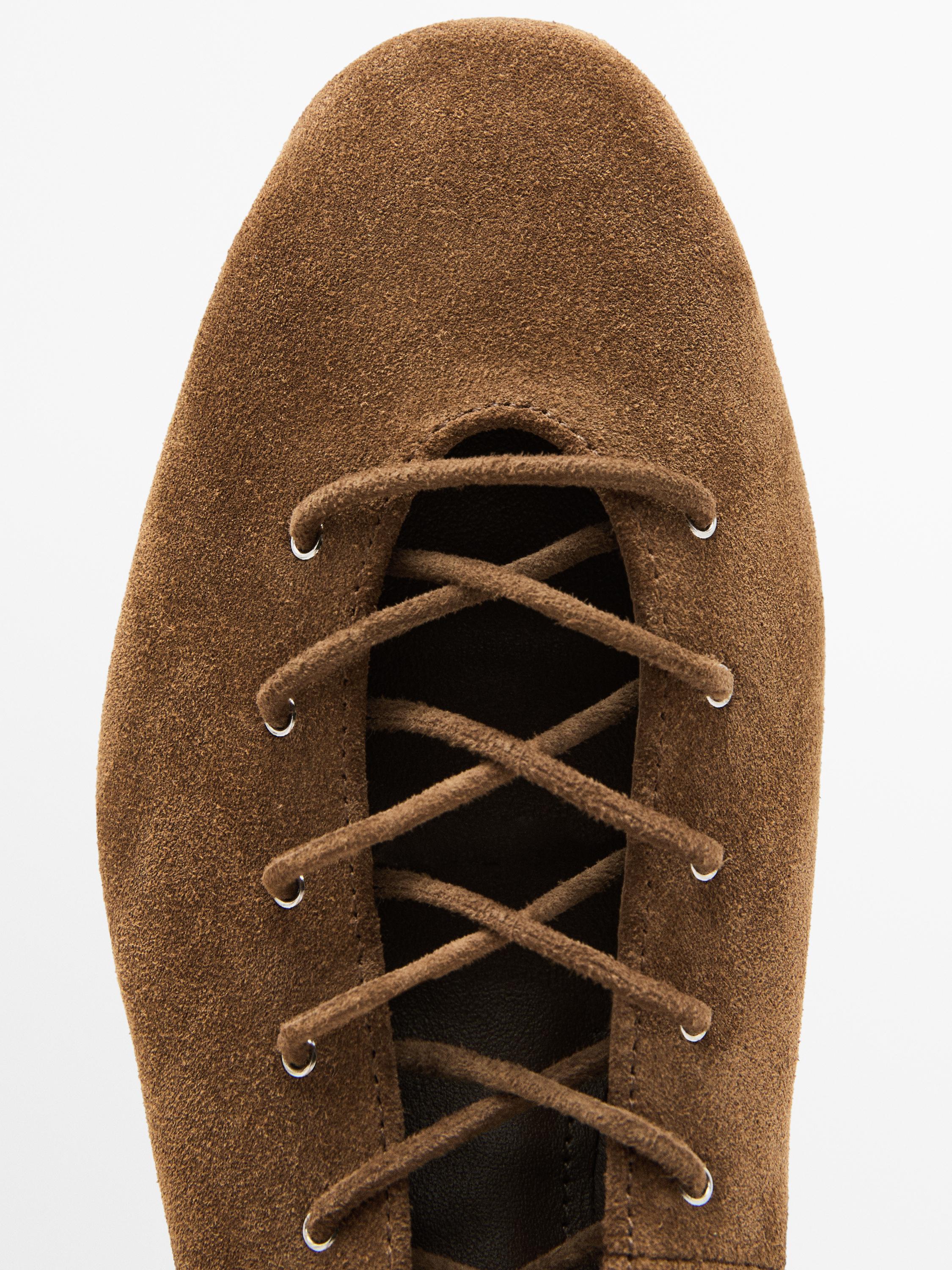 Lace-up high heel shoes