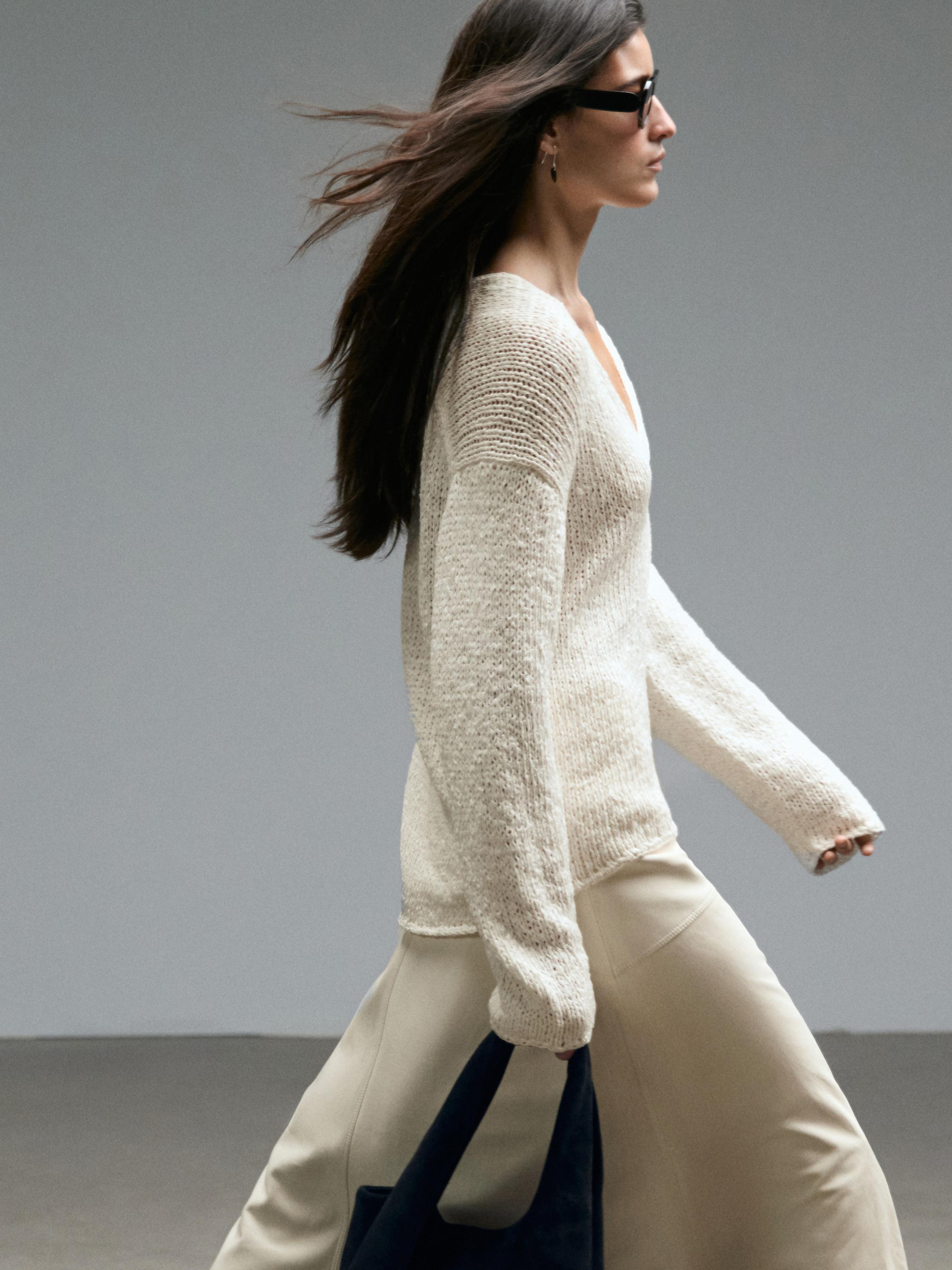 V-neck cutwork sweater