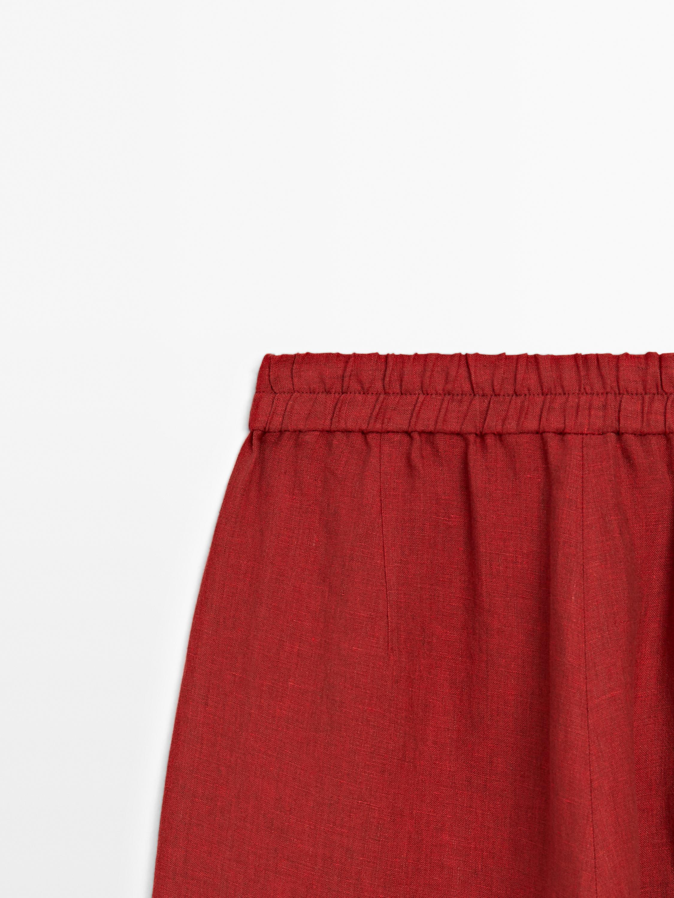 Spodnie ze 100% lnu z troczkami