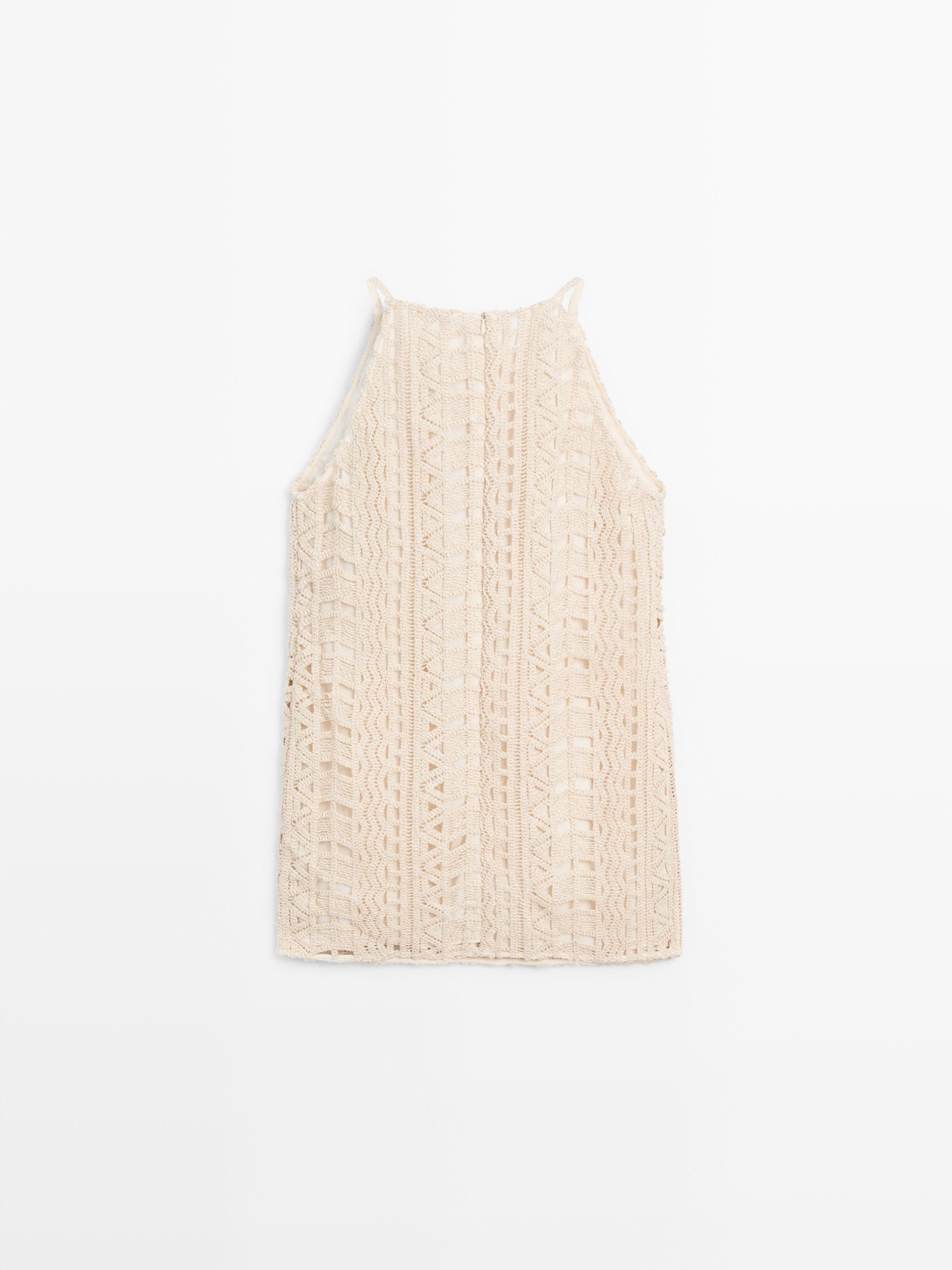 Vestido corto calado detalle metalizado