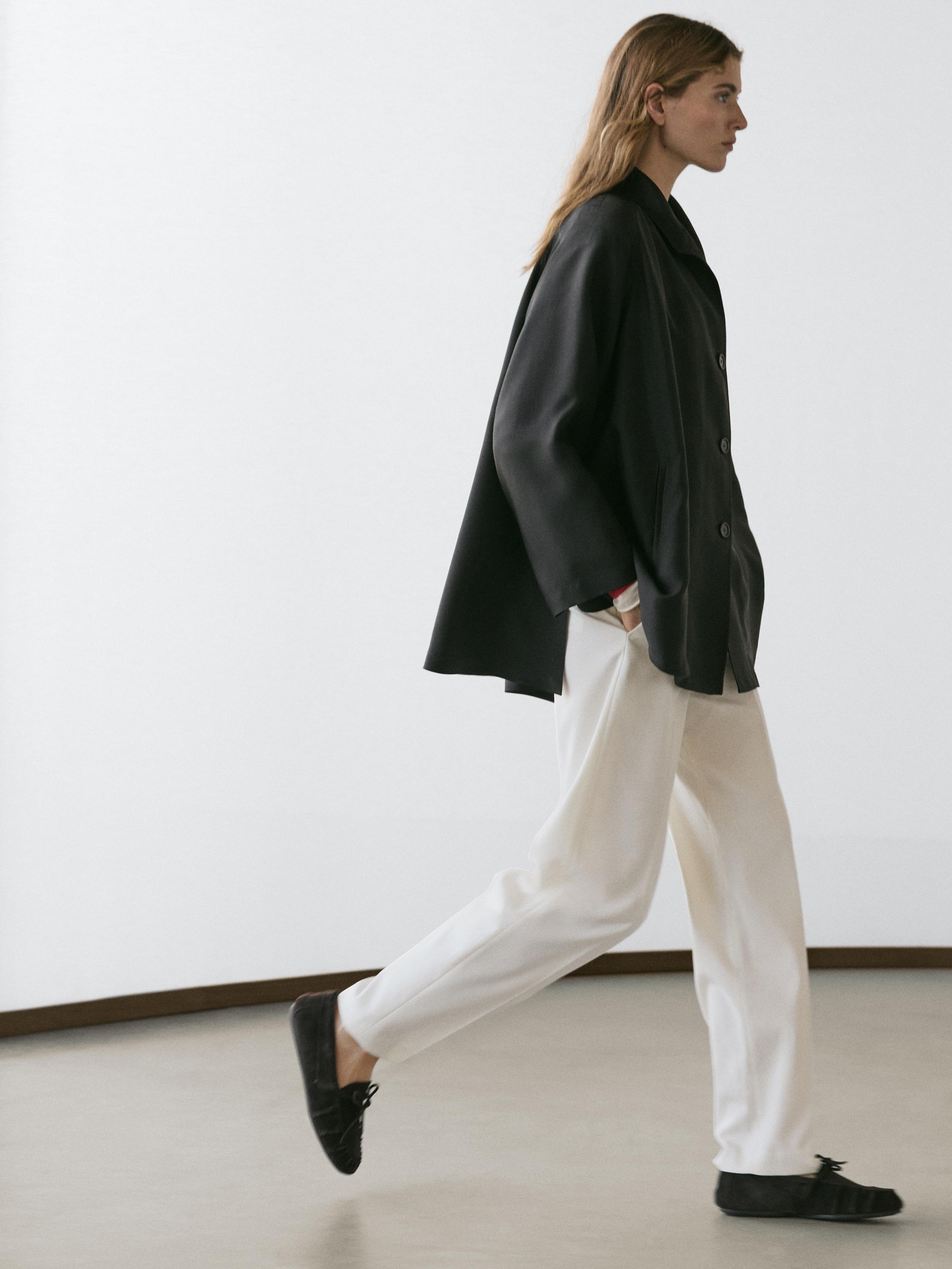 Flowing voluminous cape with button details — BLACK