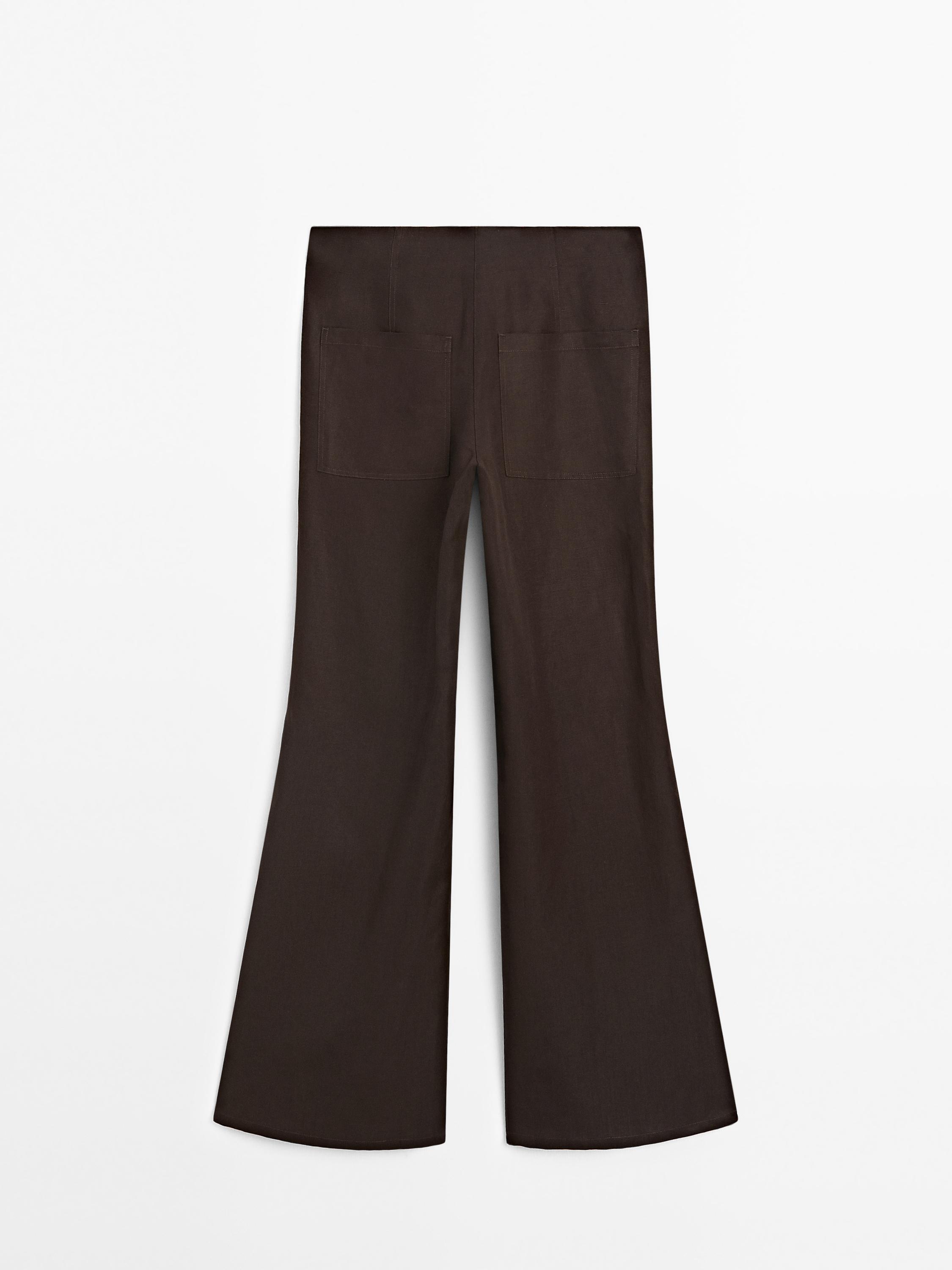 Flared trousers with seams