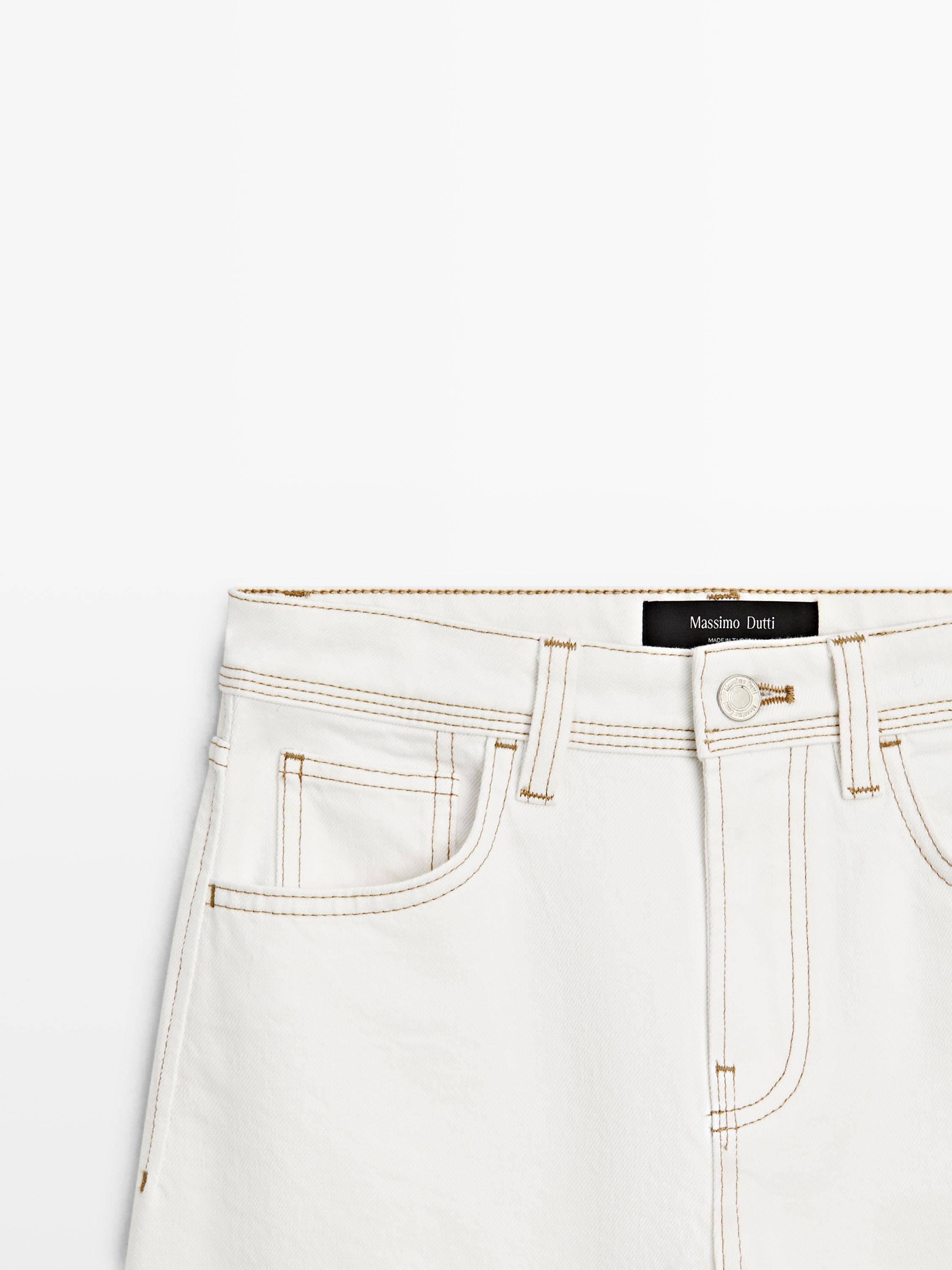 Jeans detalle bajo straight fit