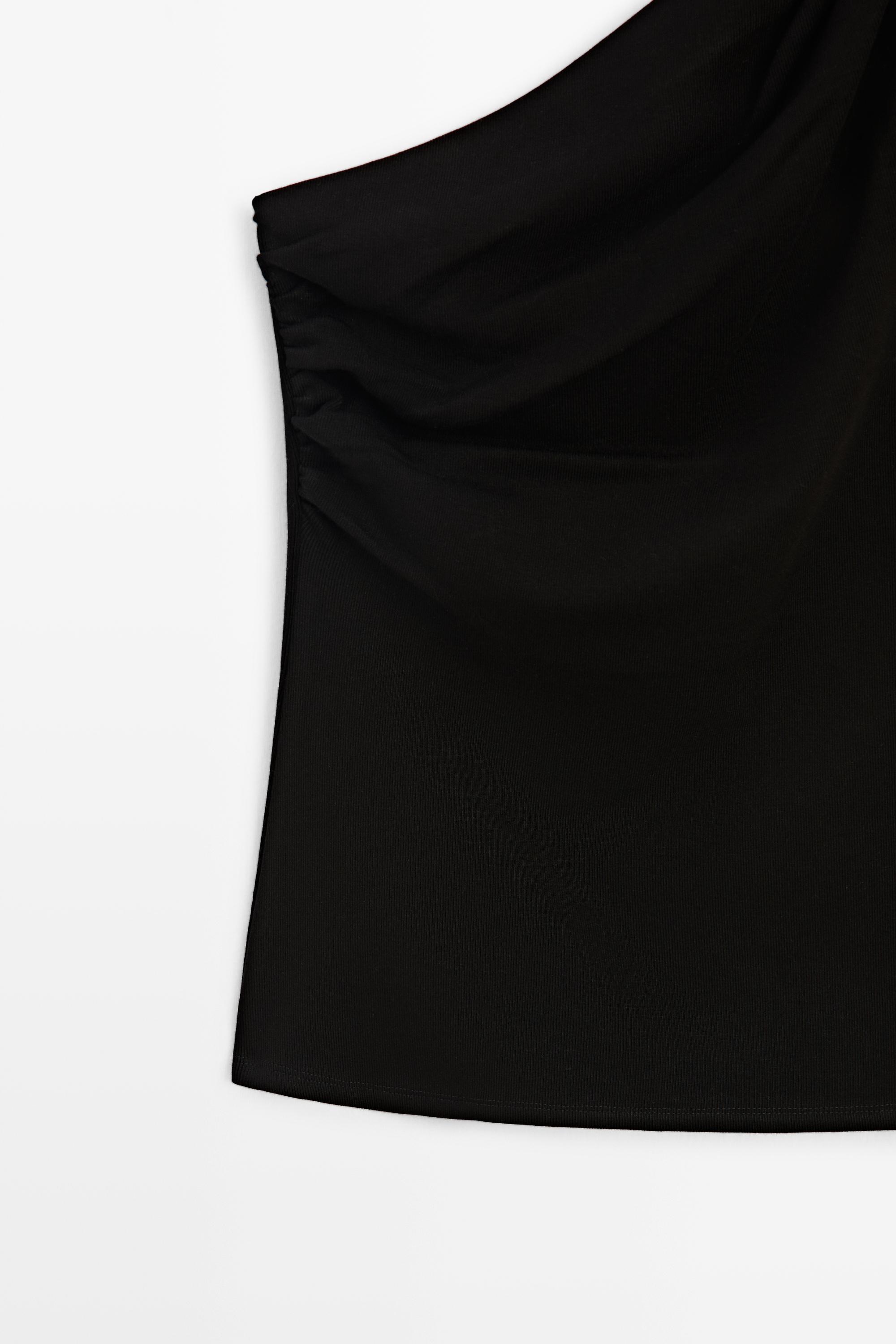 Asymmetric top with metal detail — BLACK
