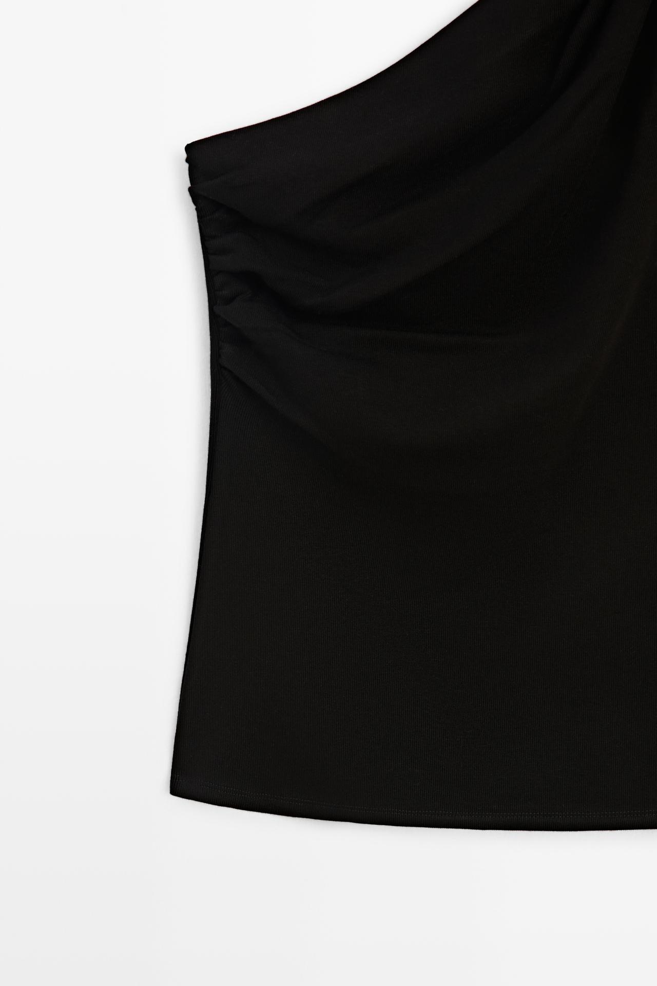 Asymmetric top with metal detail — BLACK