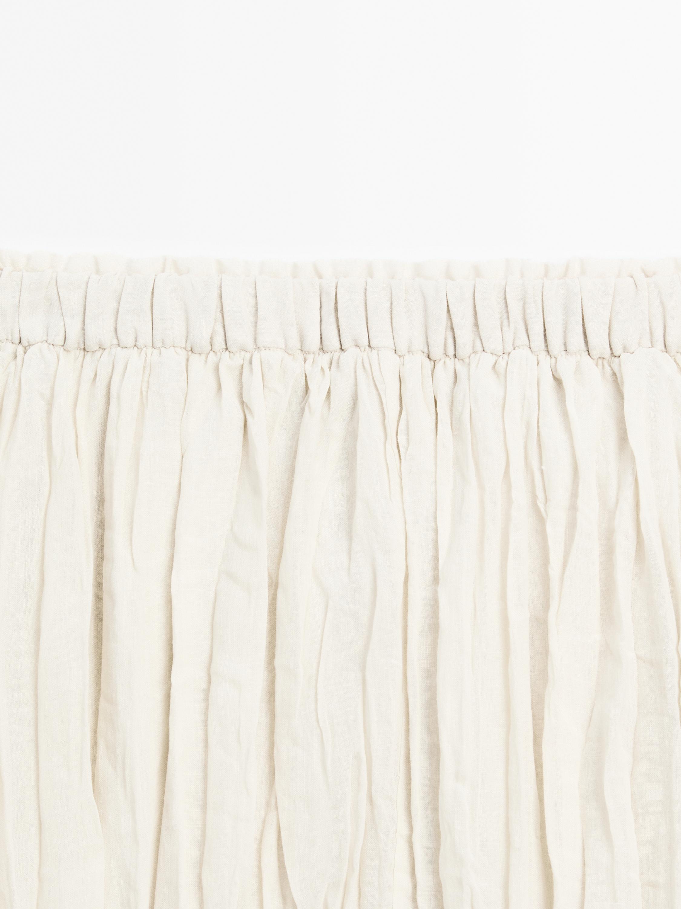 Flared pleated midi skirt