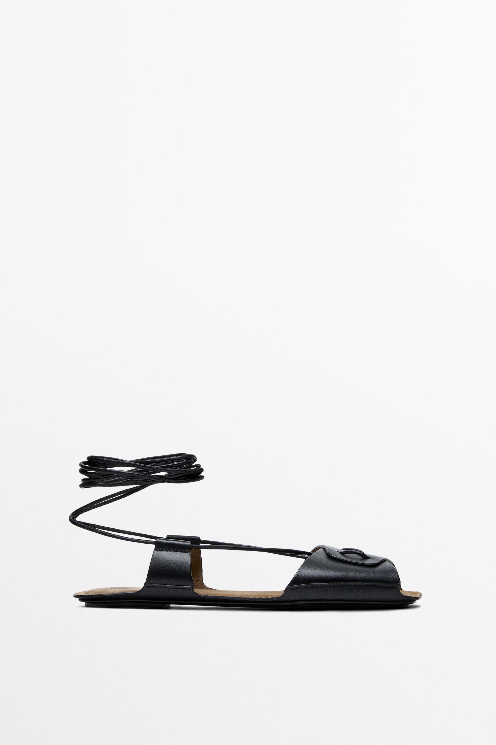 Flat leather strappy sandals