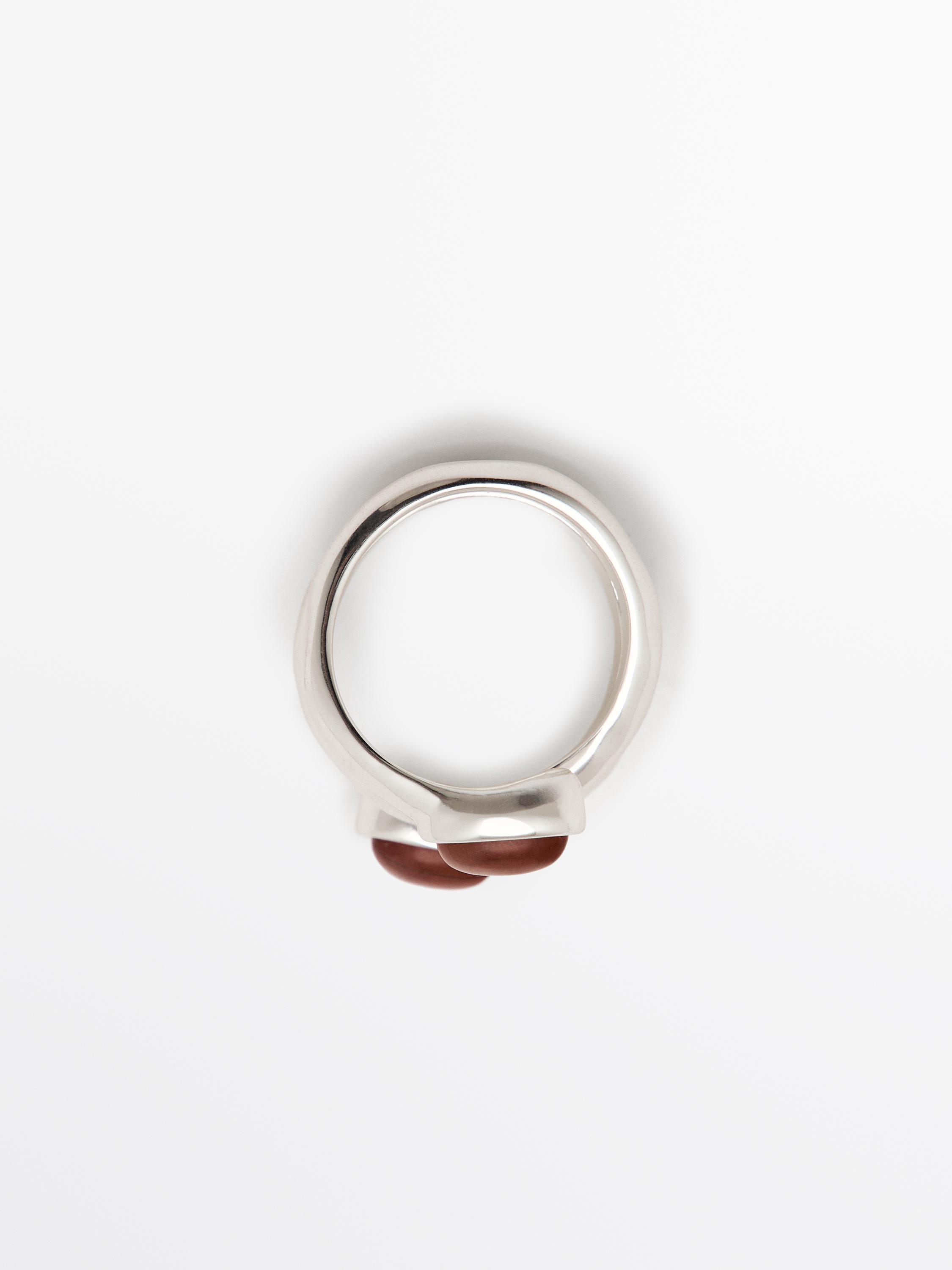 Spiral ring with encrusted details
