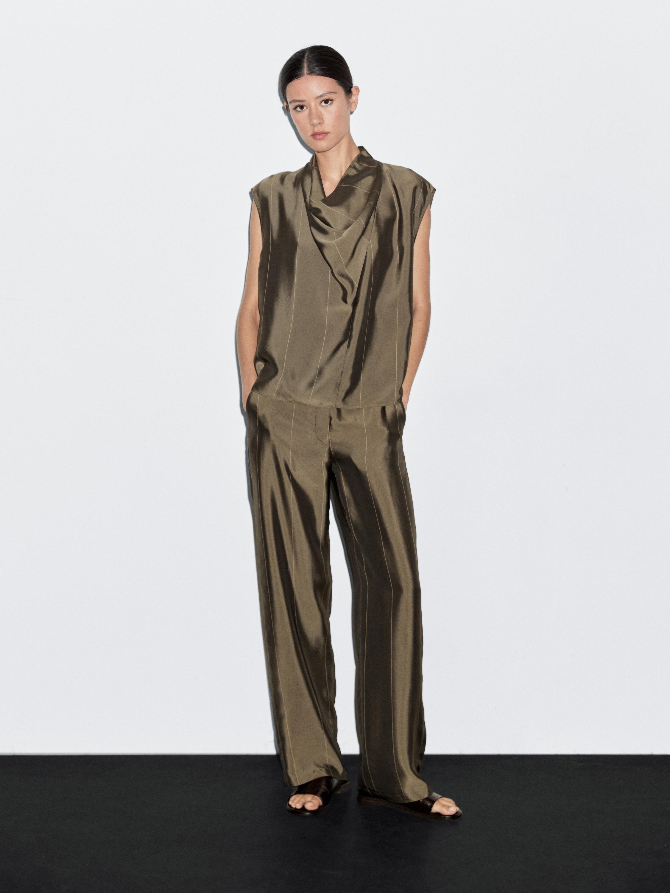 Pantalón fluido detalle rayas