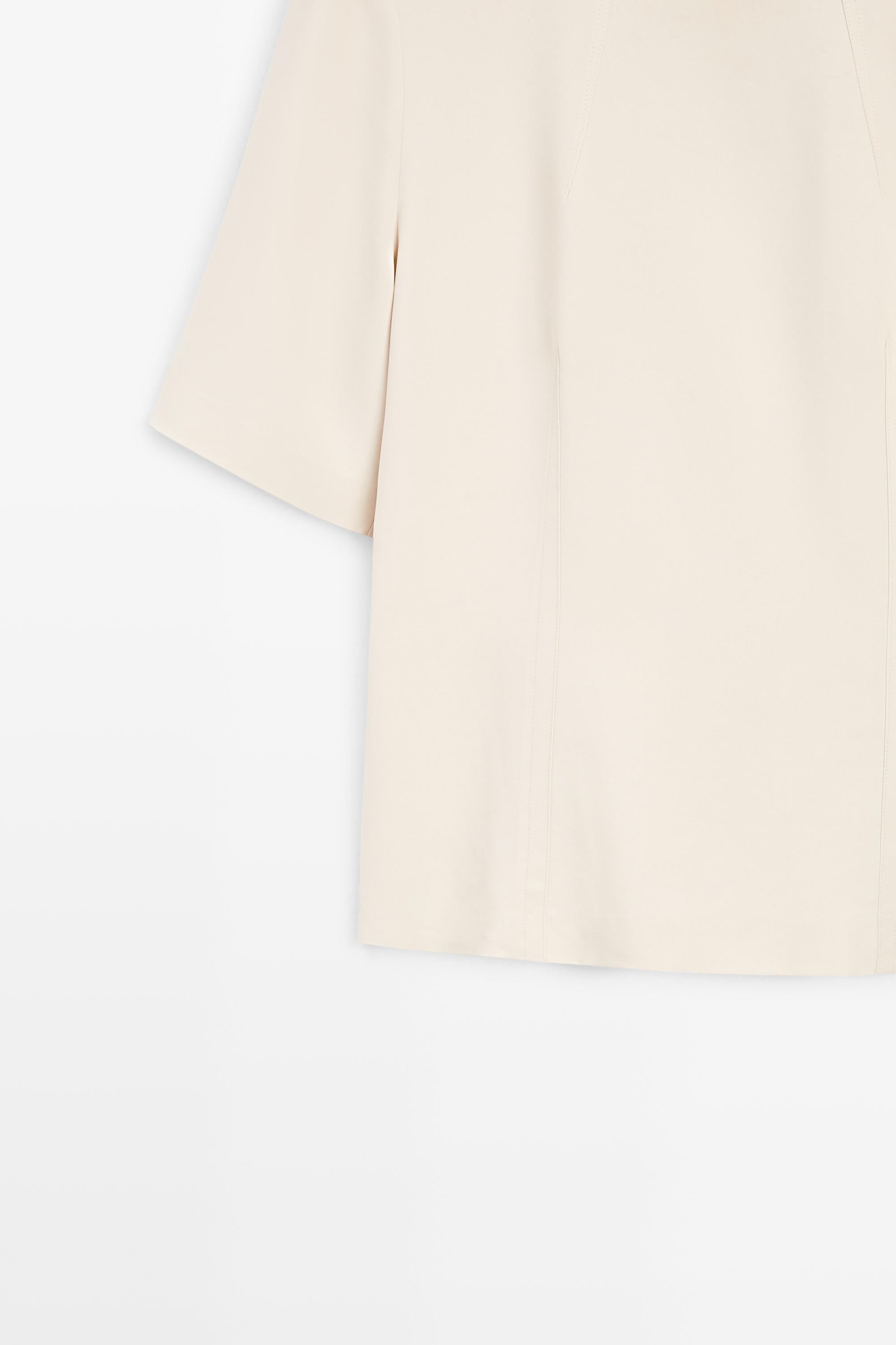 Flowing elbow-length sleeve top — CREAM