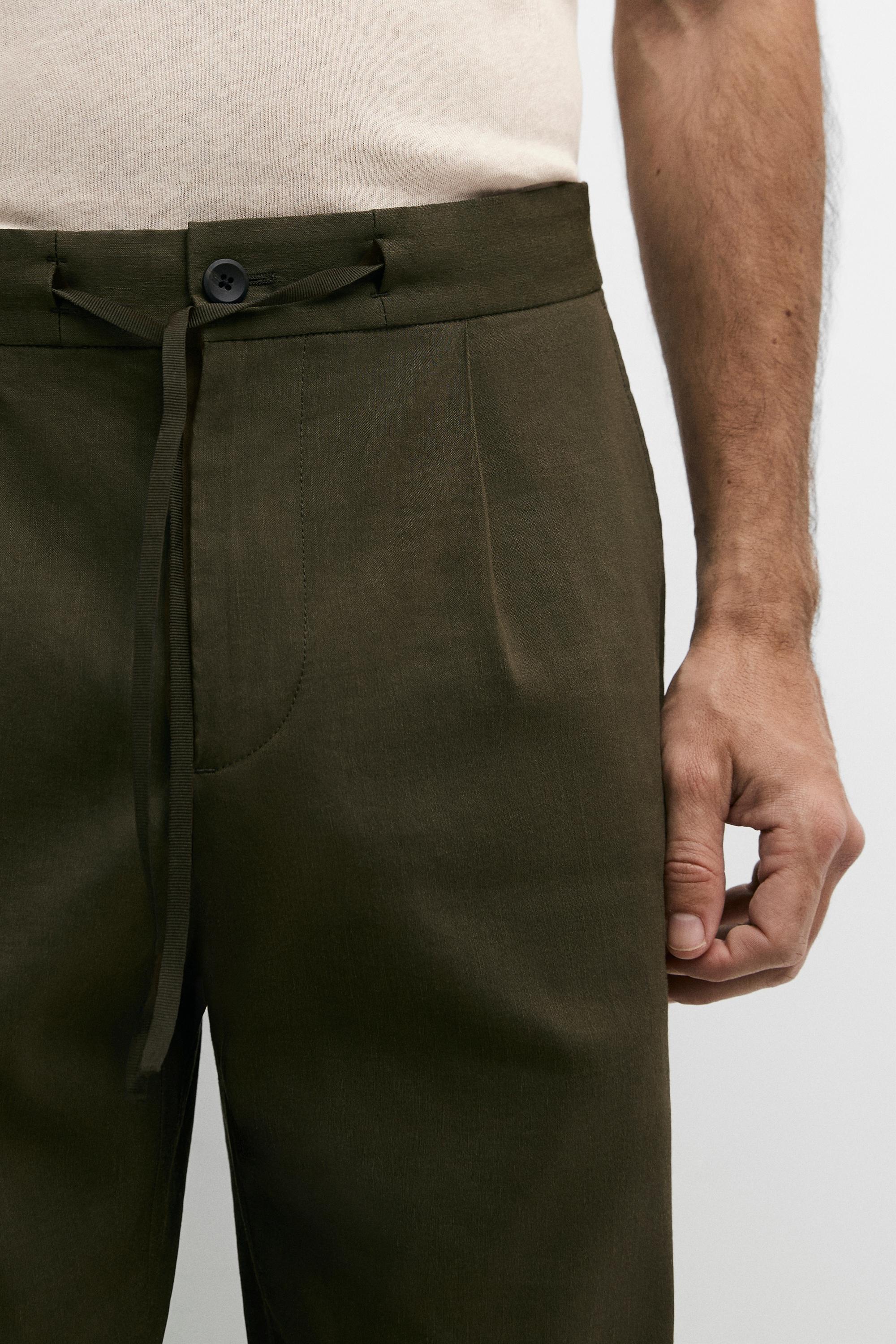 Total look darted jogger fit trousers — GREEN