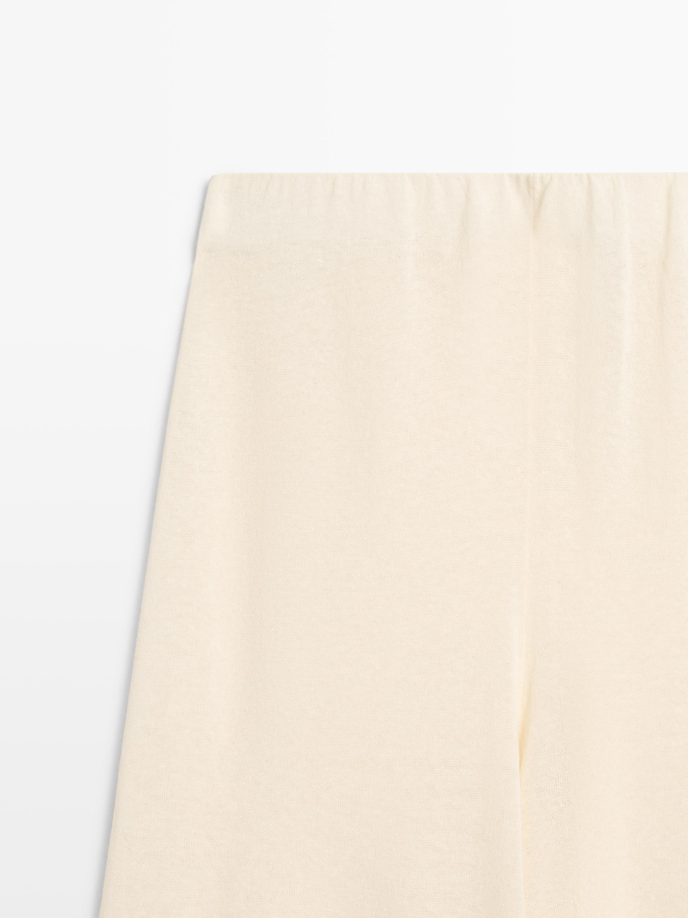 Total look wide-leg flowing trousers — Vanilla