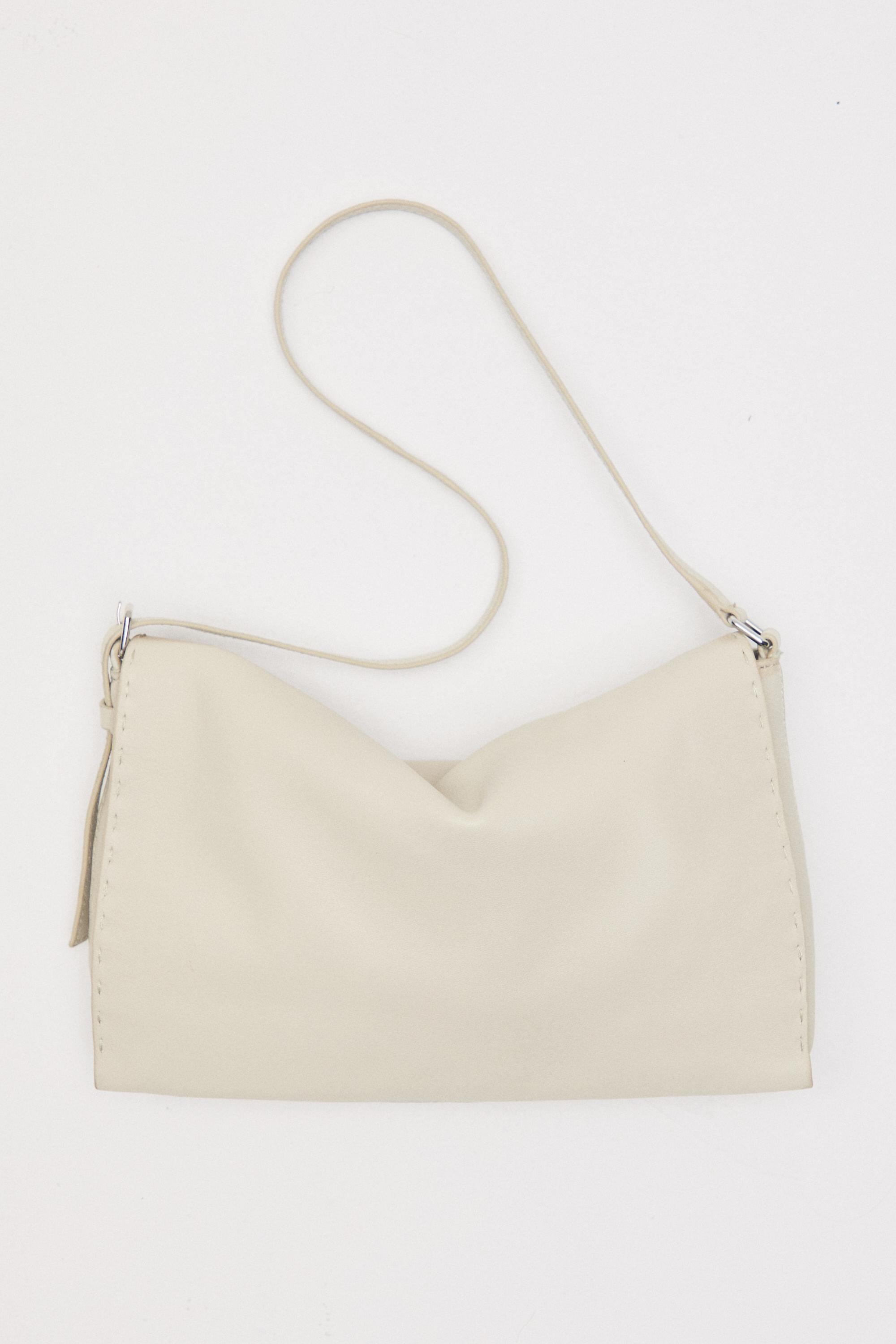 Nappa leather crossbody bag with topstitching — Gold