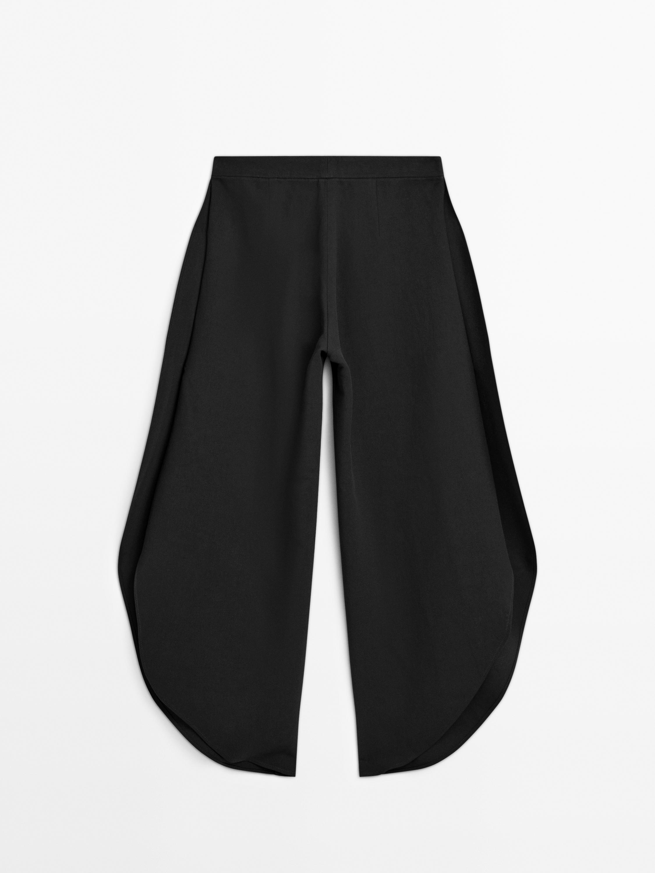 Byxor med slits vid bensluten - Limited Edition