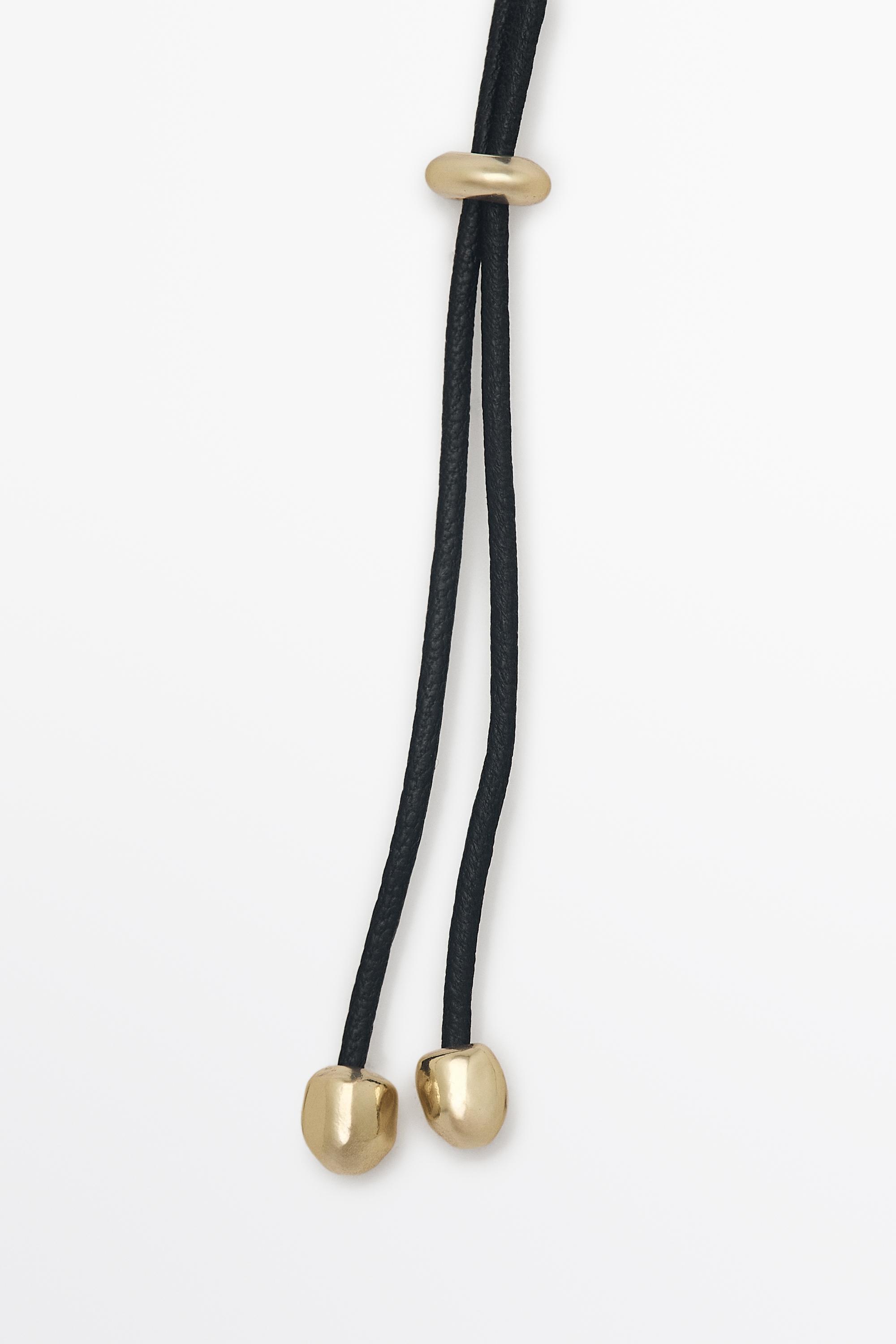 Long shield-effect piece necklace — GOLDEN