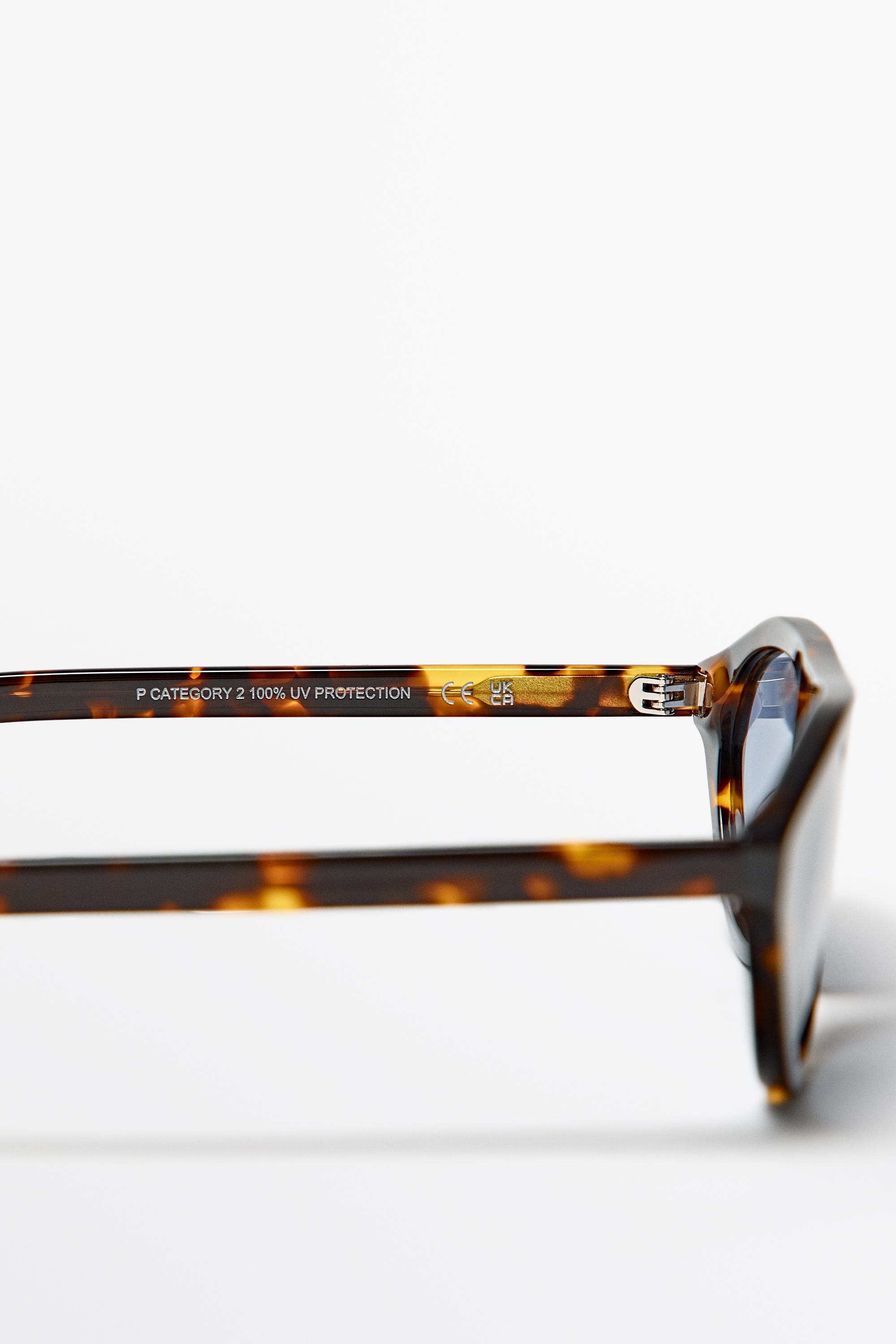 Oval sunglasses — BROWN