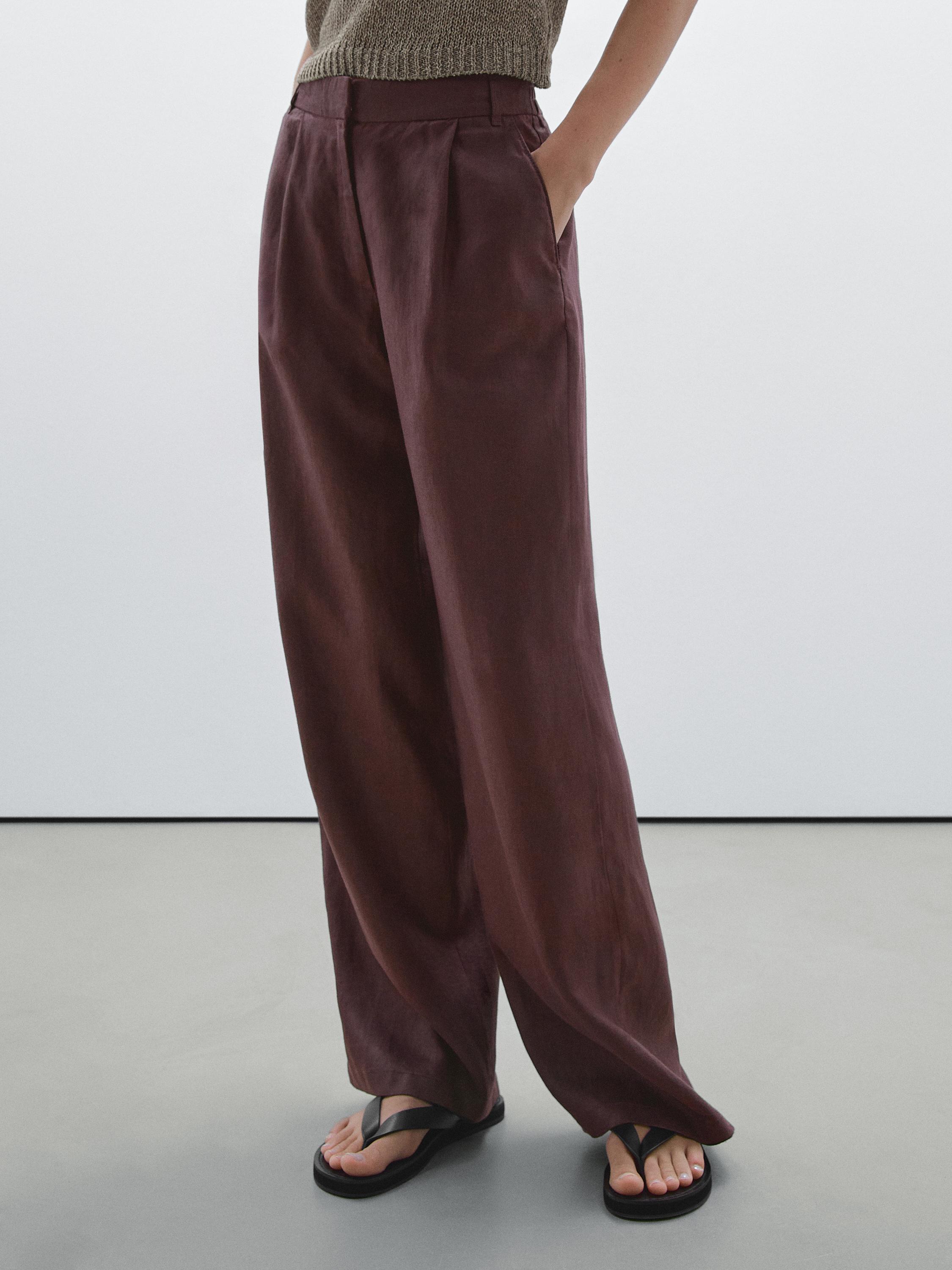 100% linen wide-leg elastic detail trousers