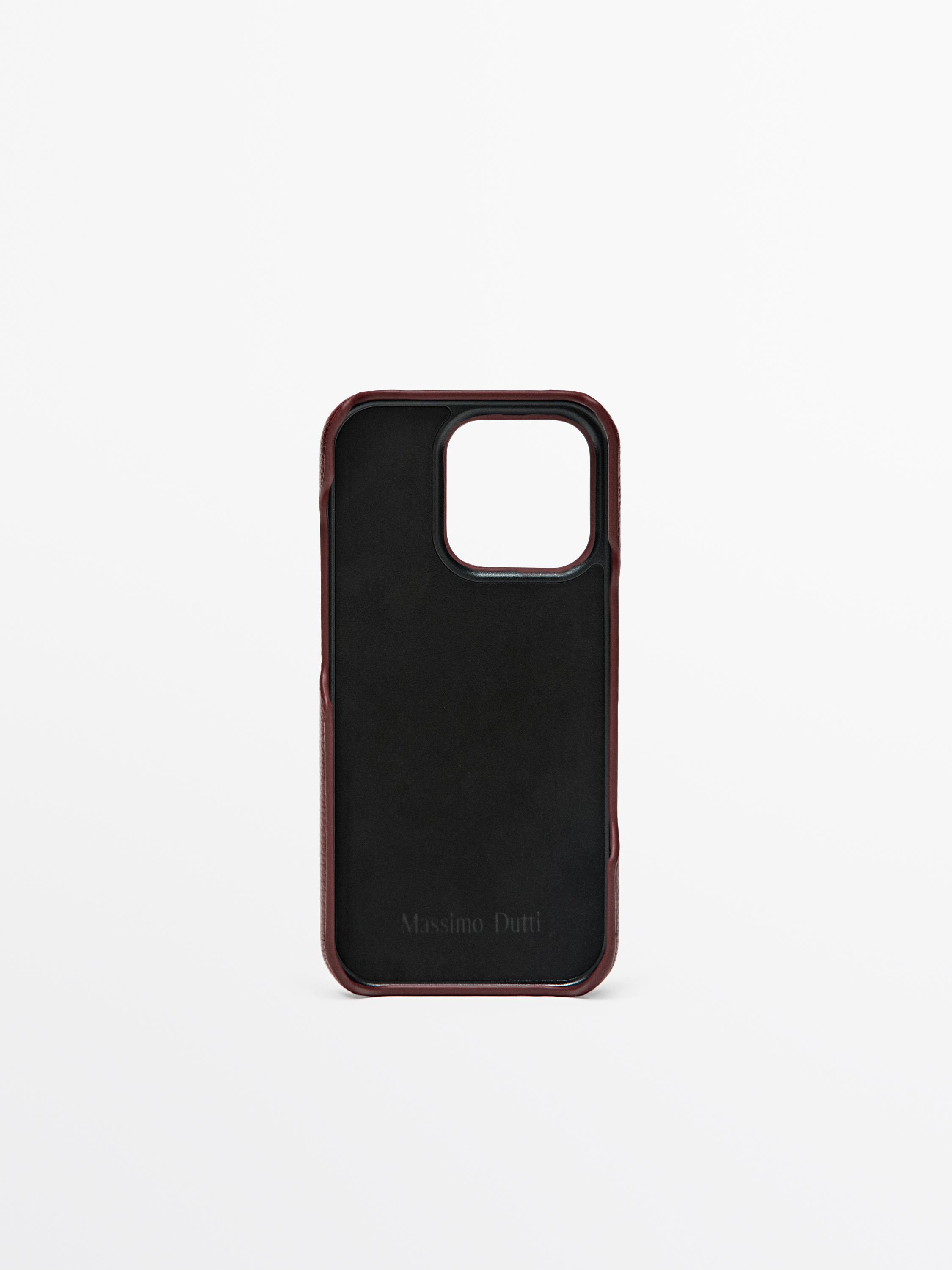 Front view of an iPhone 16 Pro case in red with a raised edge and "Massimo Dutti" text at the bottom.