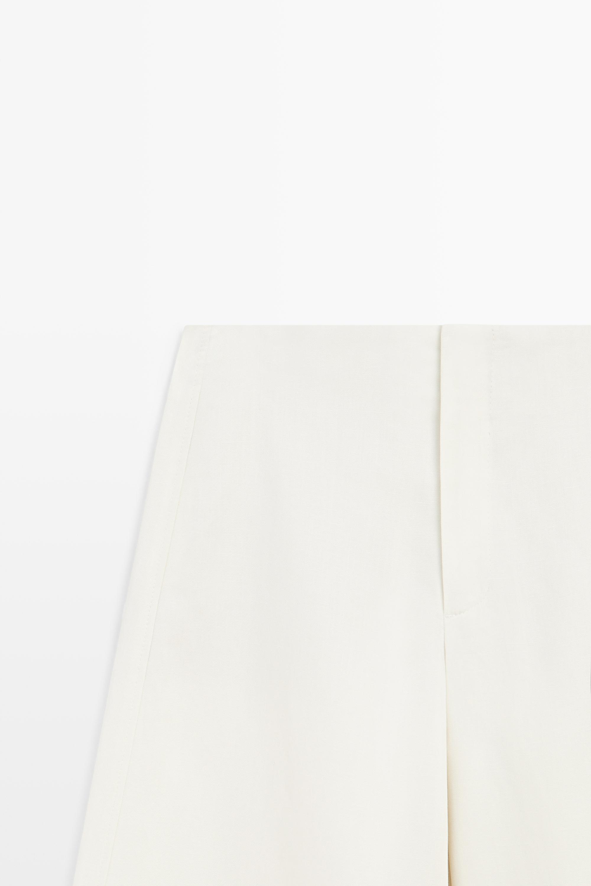 Flowing barrel fit trousers — OFF WHITE