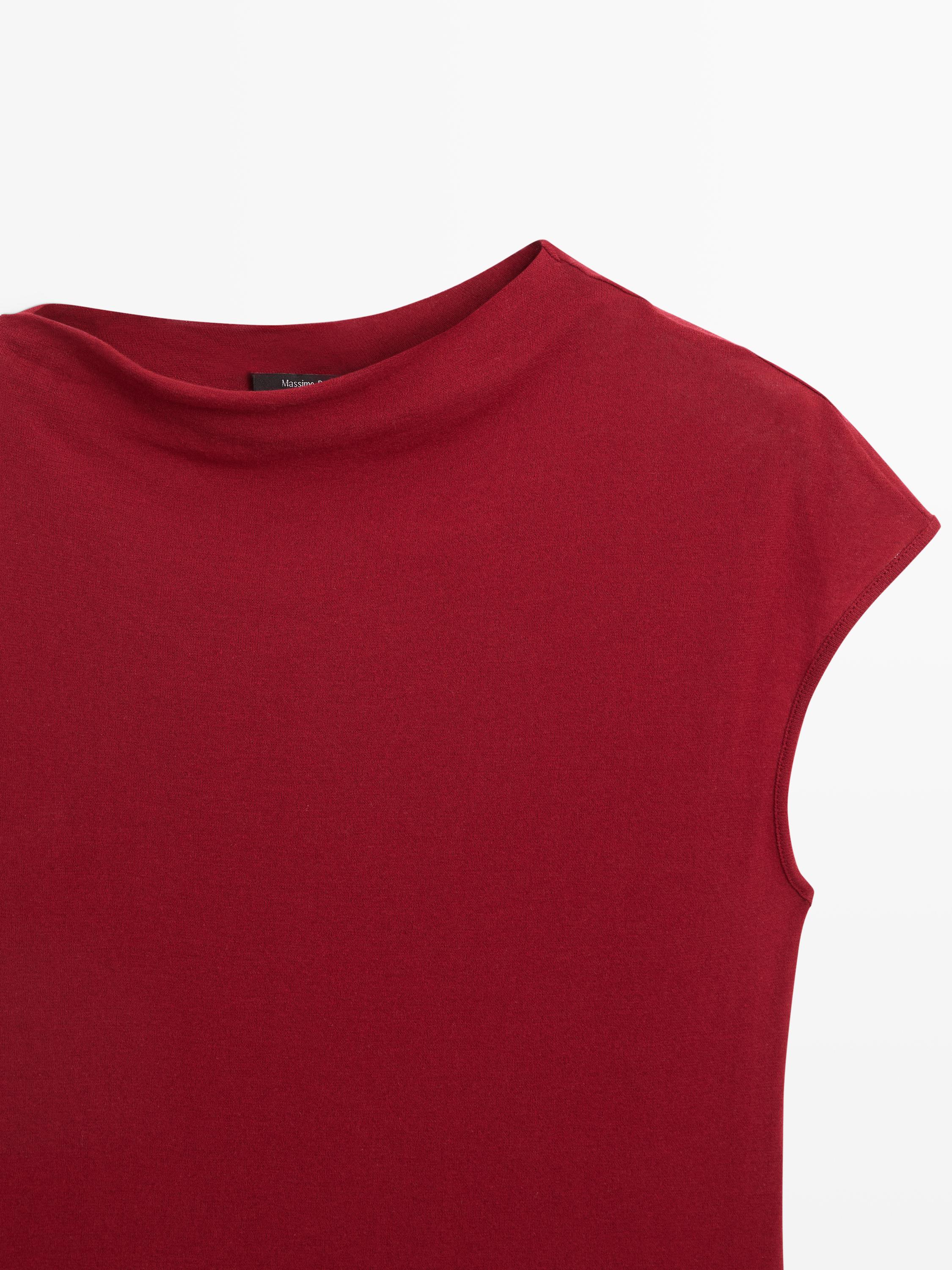 100% cotton top with asymmetric detail
