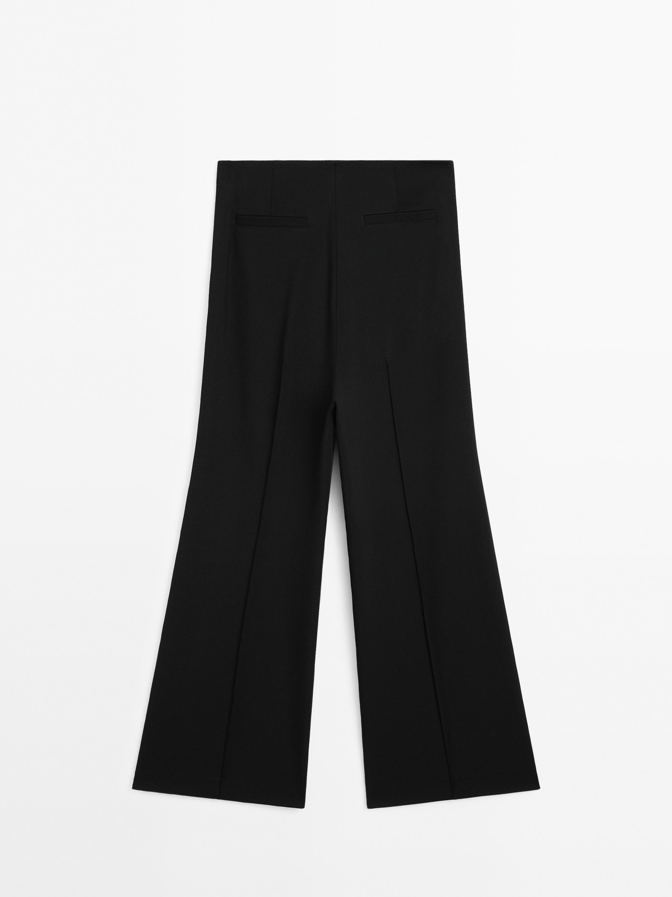 Pantaloni flare fit cerniera