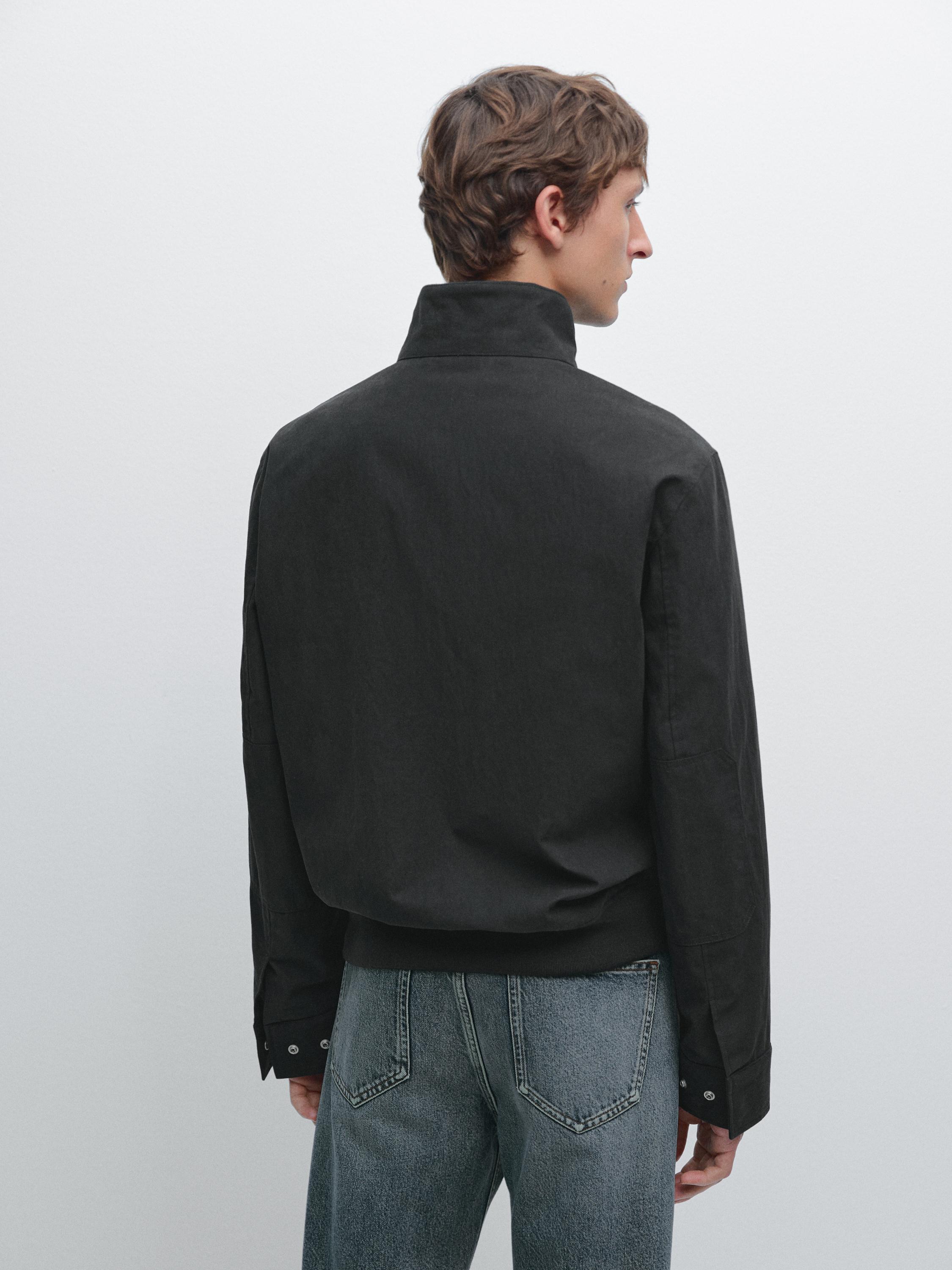 Jachetă cu textură de piersică și detaliu la coate