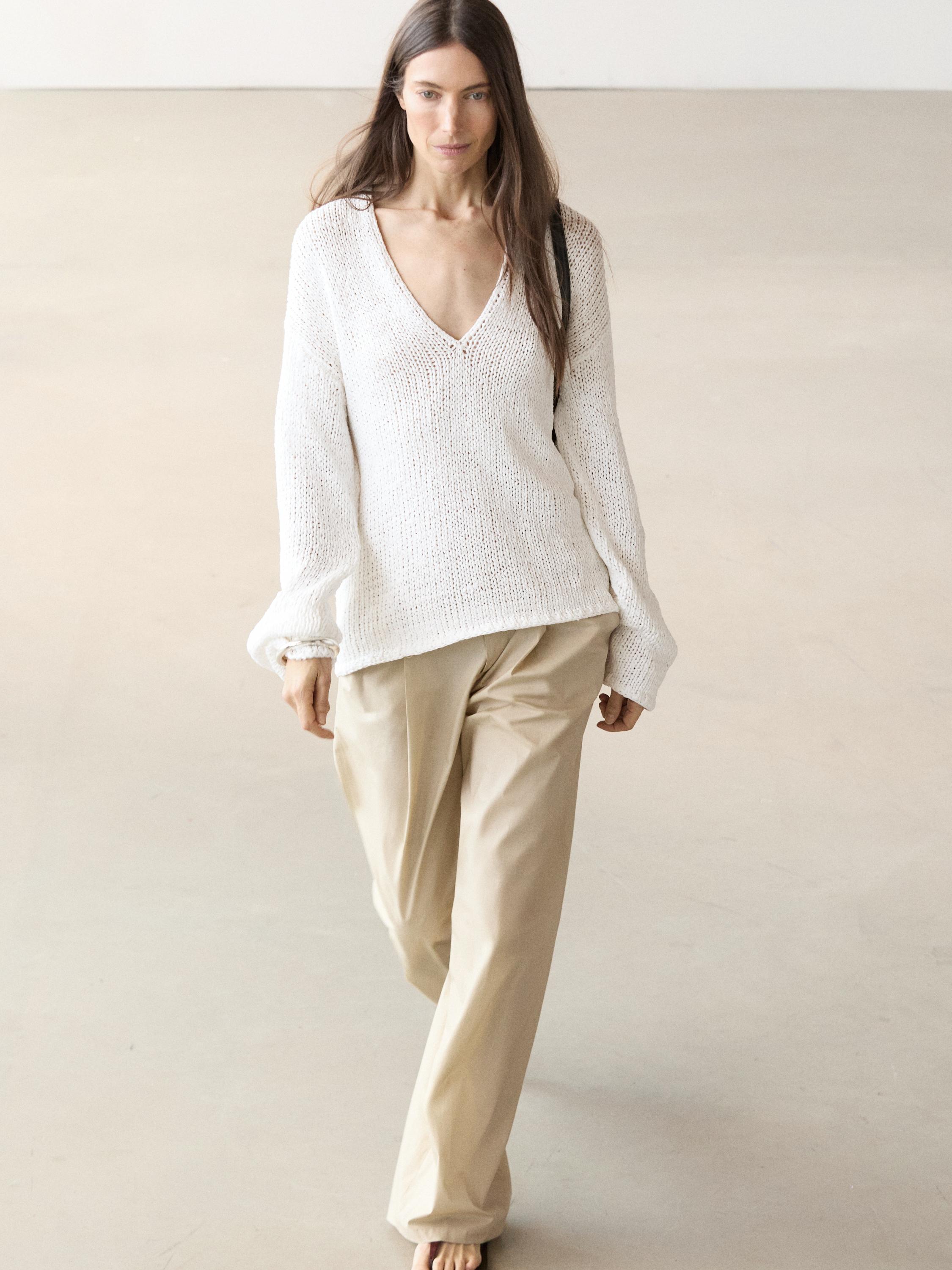 V-neck cutwork sweater
