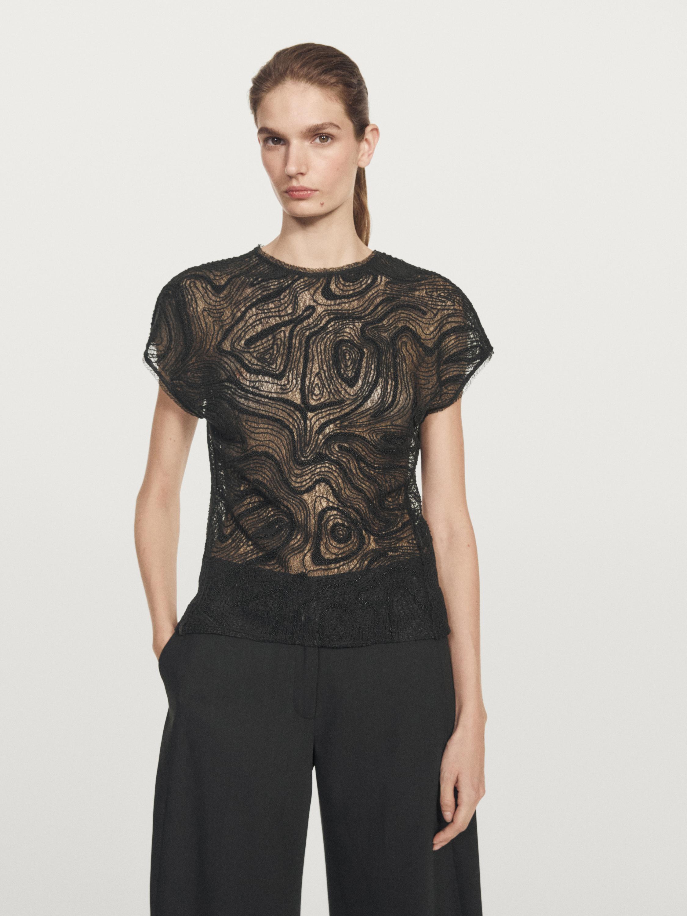 Semi-sheer embroidered top