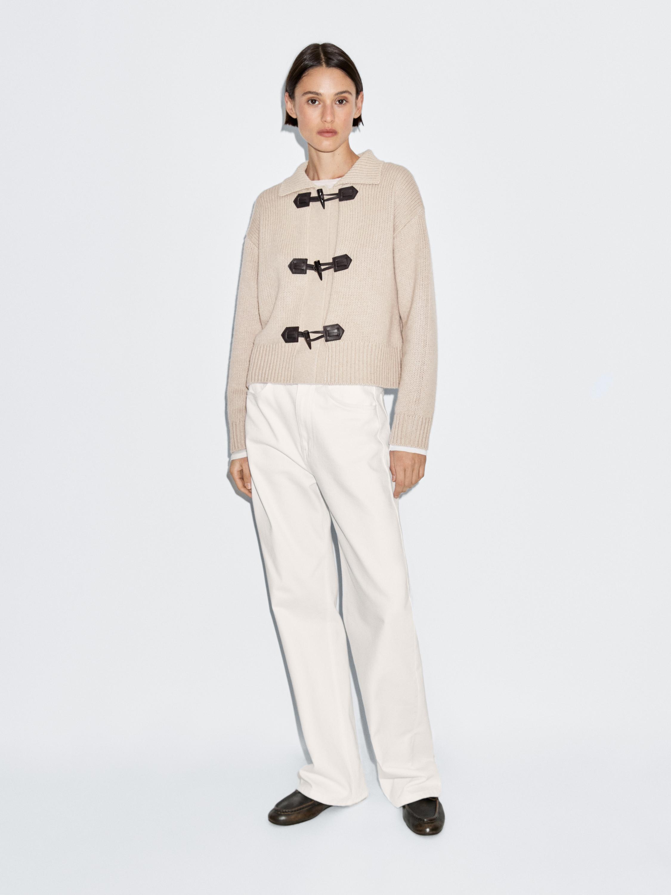 Jopa z gumbom v obliki roga z volno