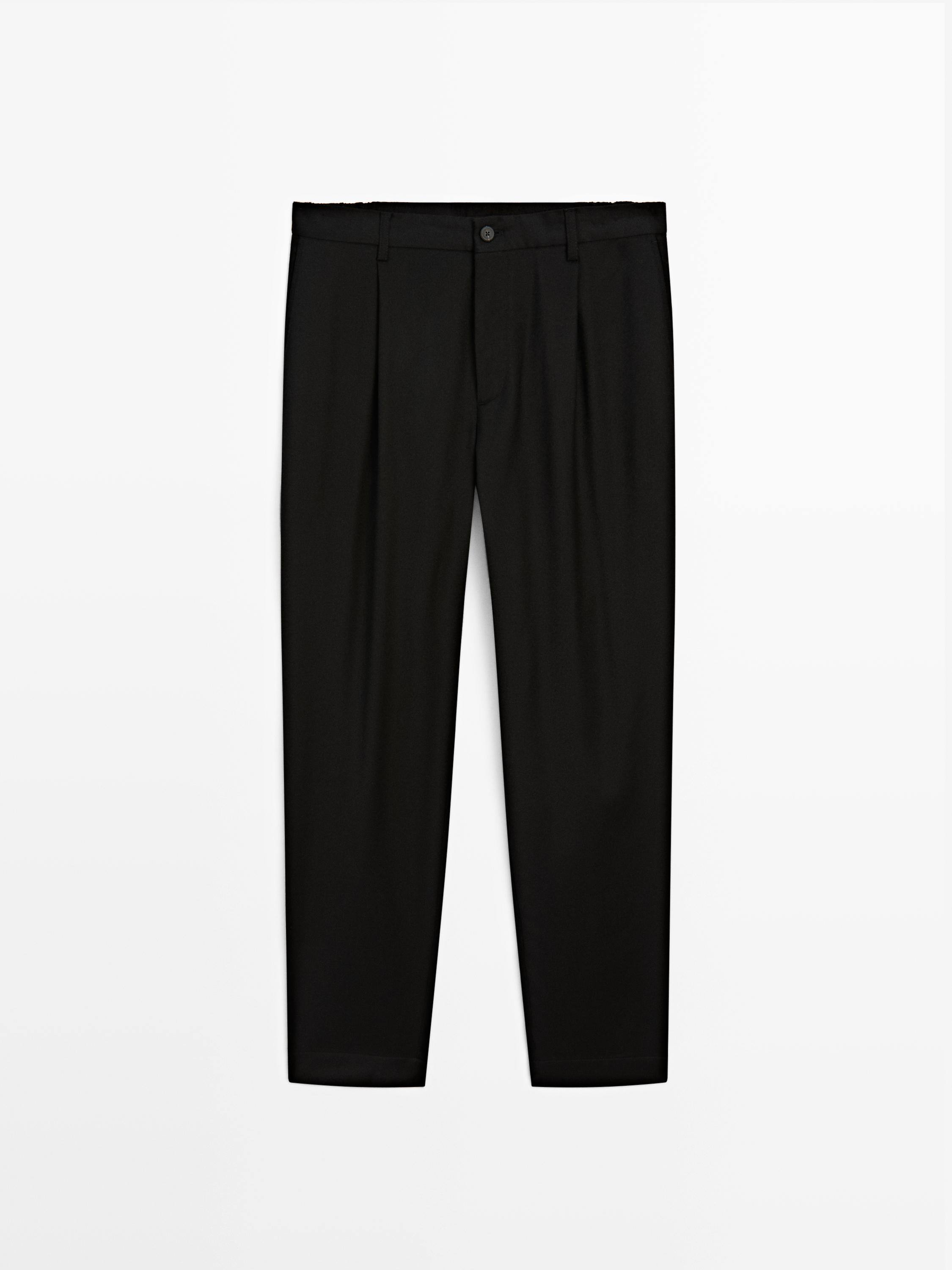 Relaxed fit wool blend darted trousers