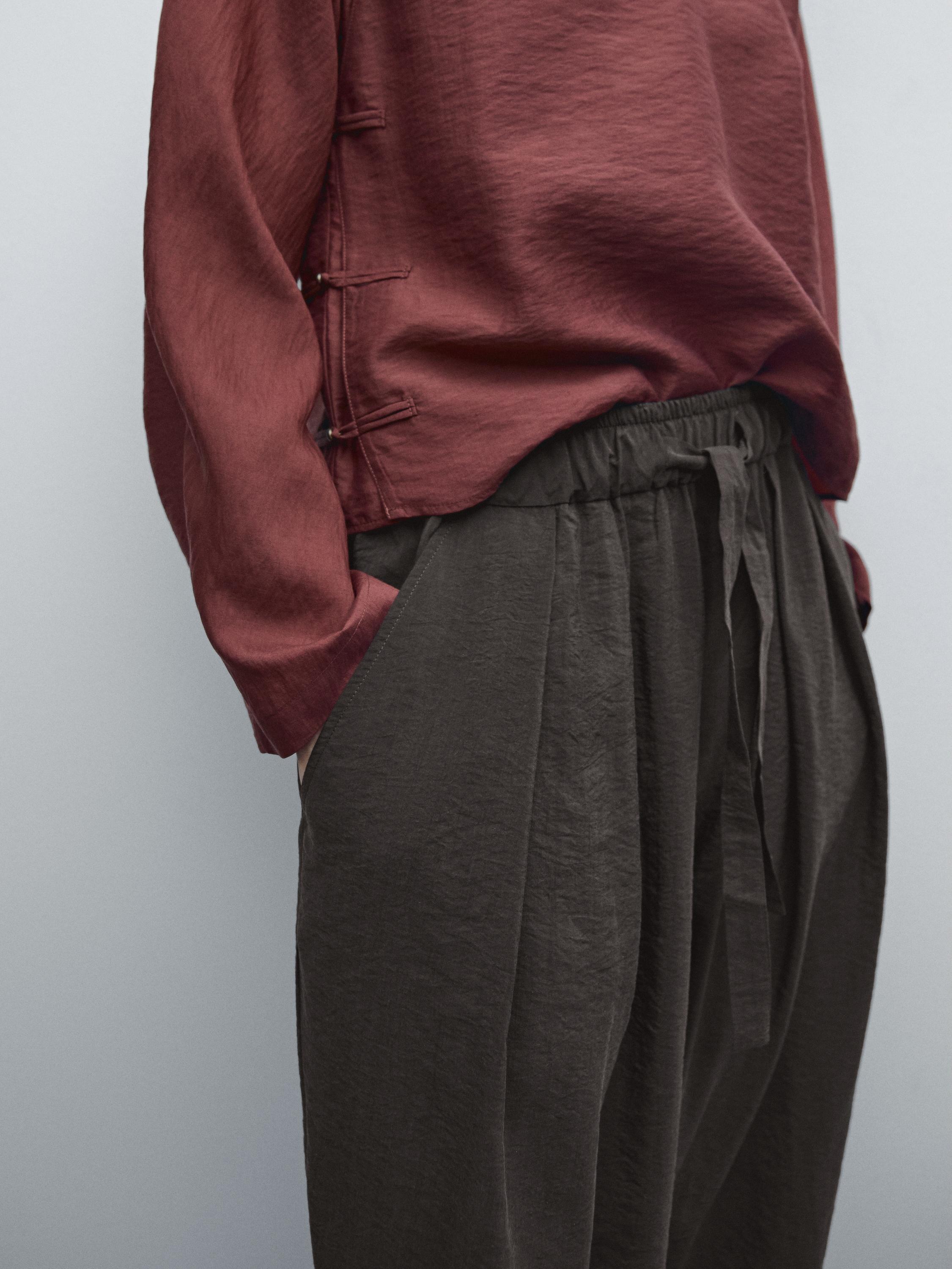 Voluminous silk blend trousers