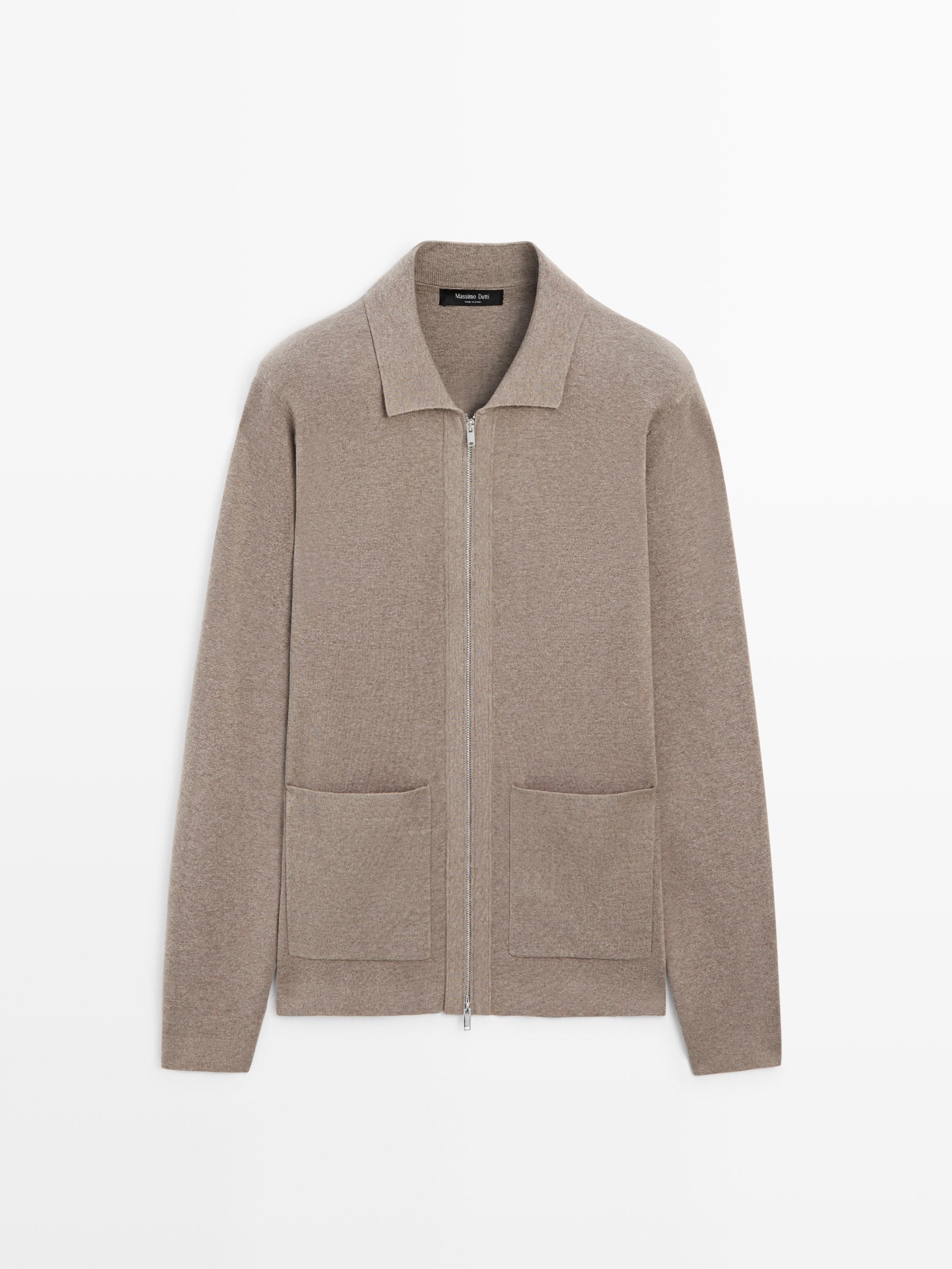 Adīta jaka no jauktas kokvilnas un vilnas ar kabatām