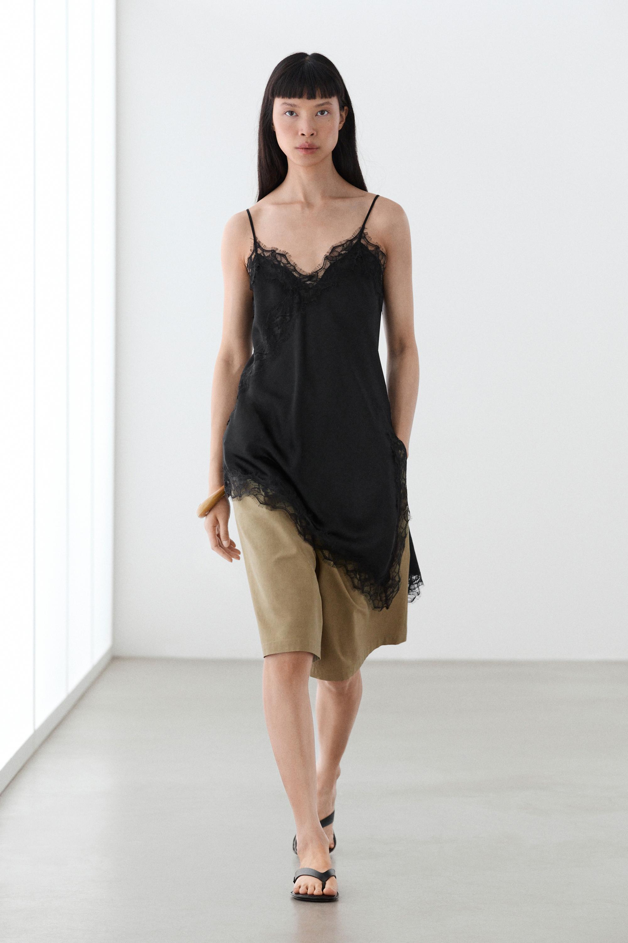 Asymmetric thin strap camisole top — BLACK