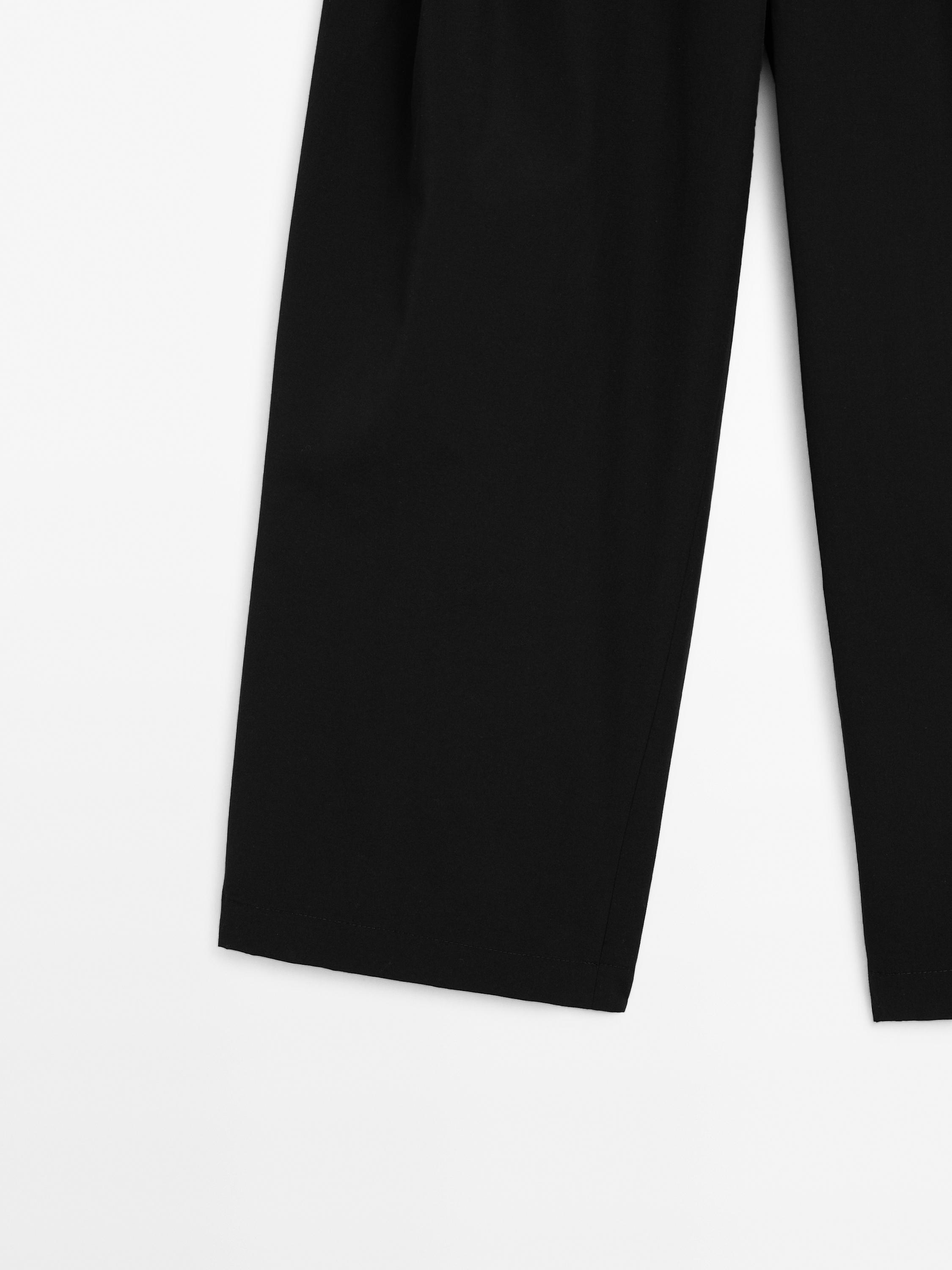 Wide-leg cotton blend trousers