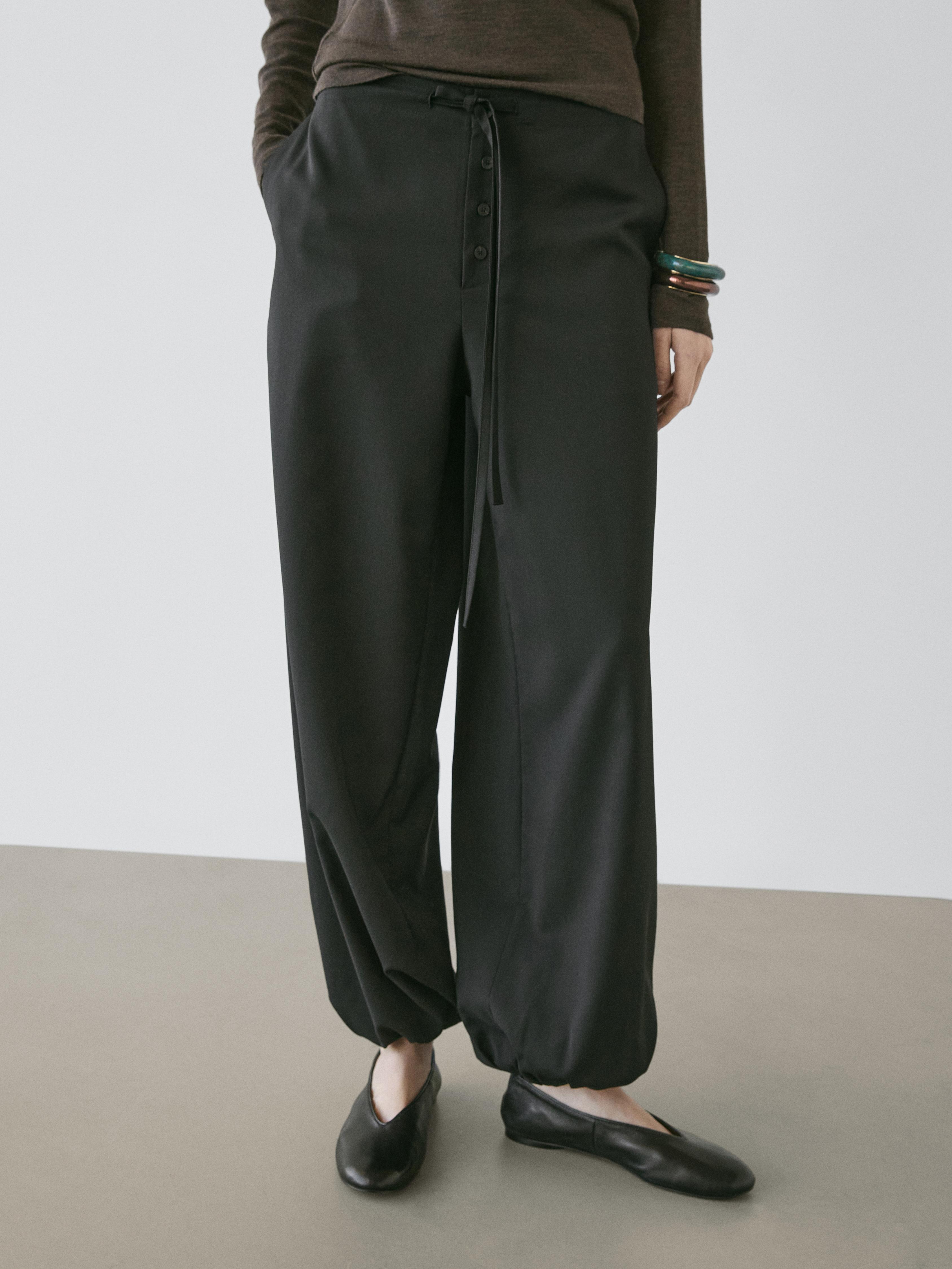 Wool sarouel trousers with tie detail — BLACK