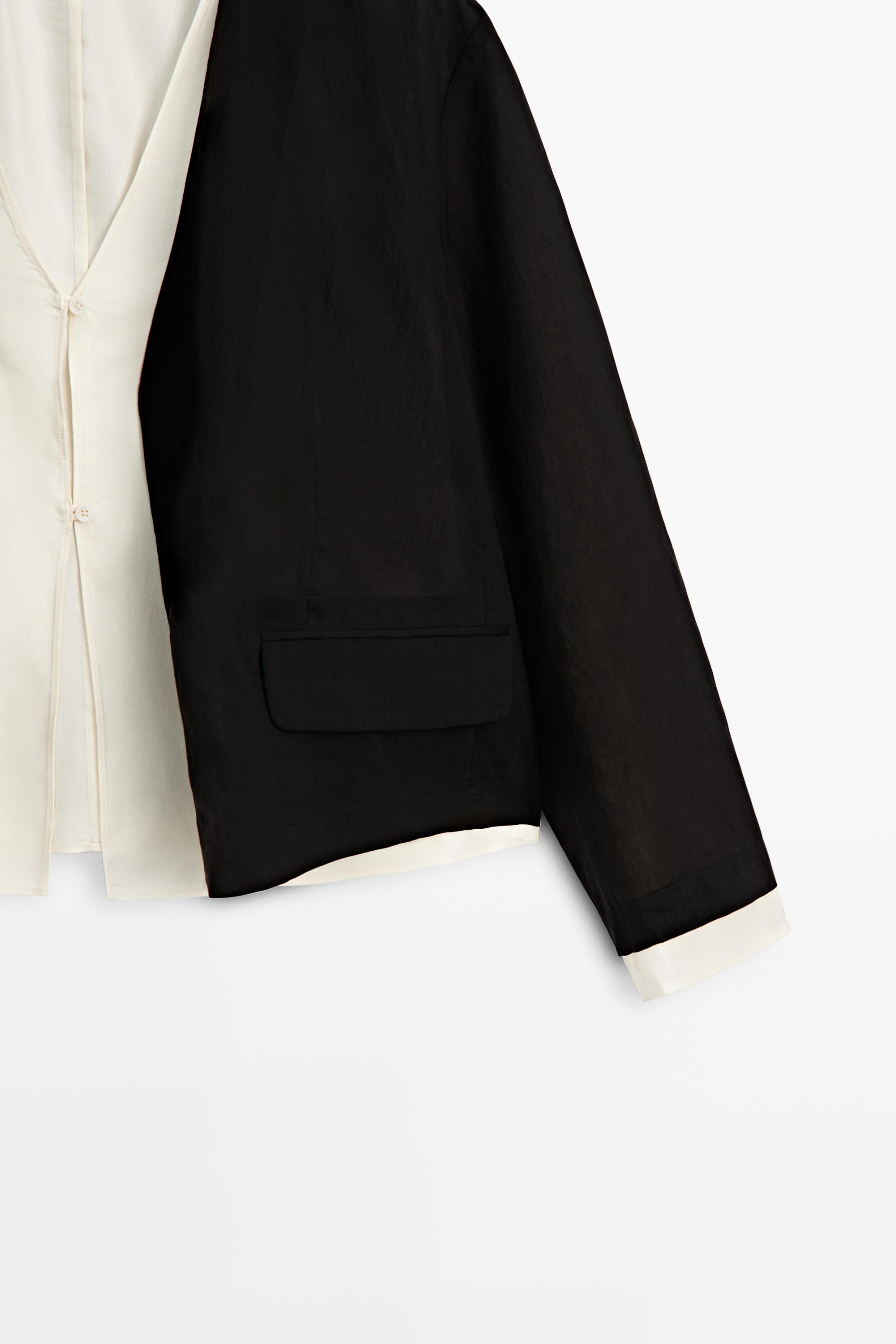 Contrast double jacket for a complete look — BLACK