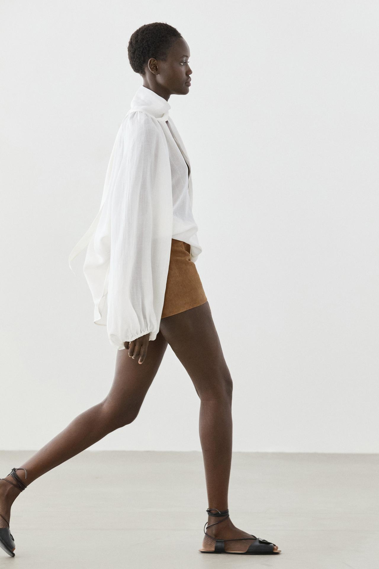 Flowing V-neck blouse with tie — WHITE