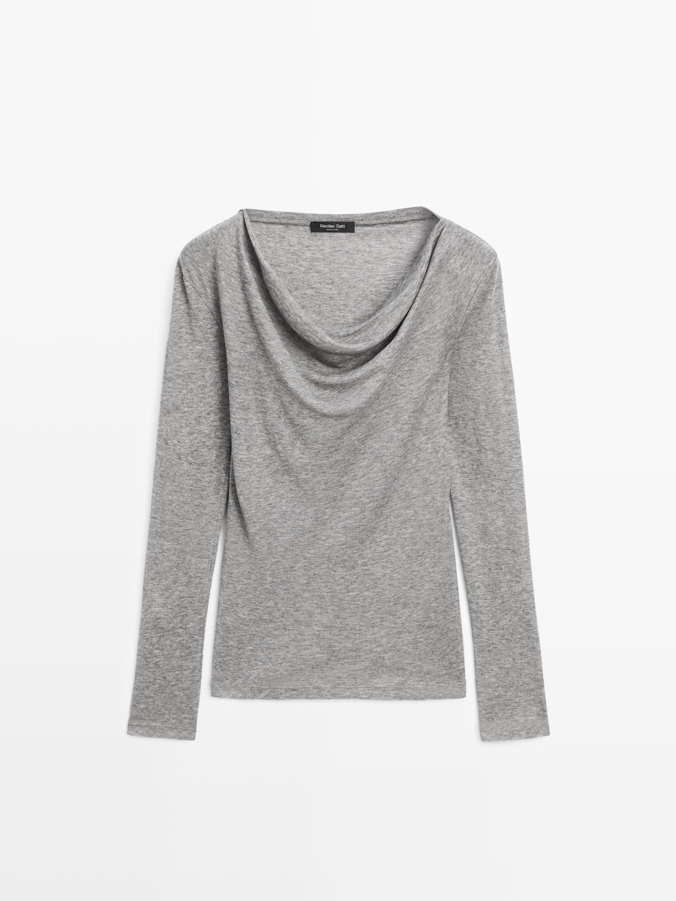 Bluzë me mëngë të gjata dhe jakë të varur