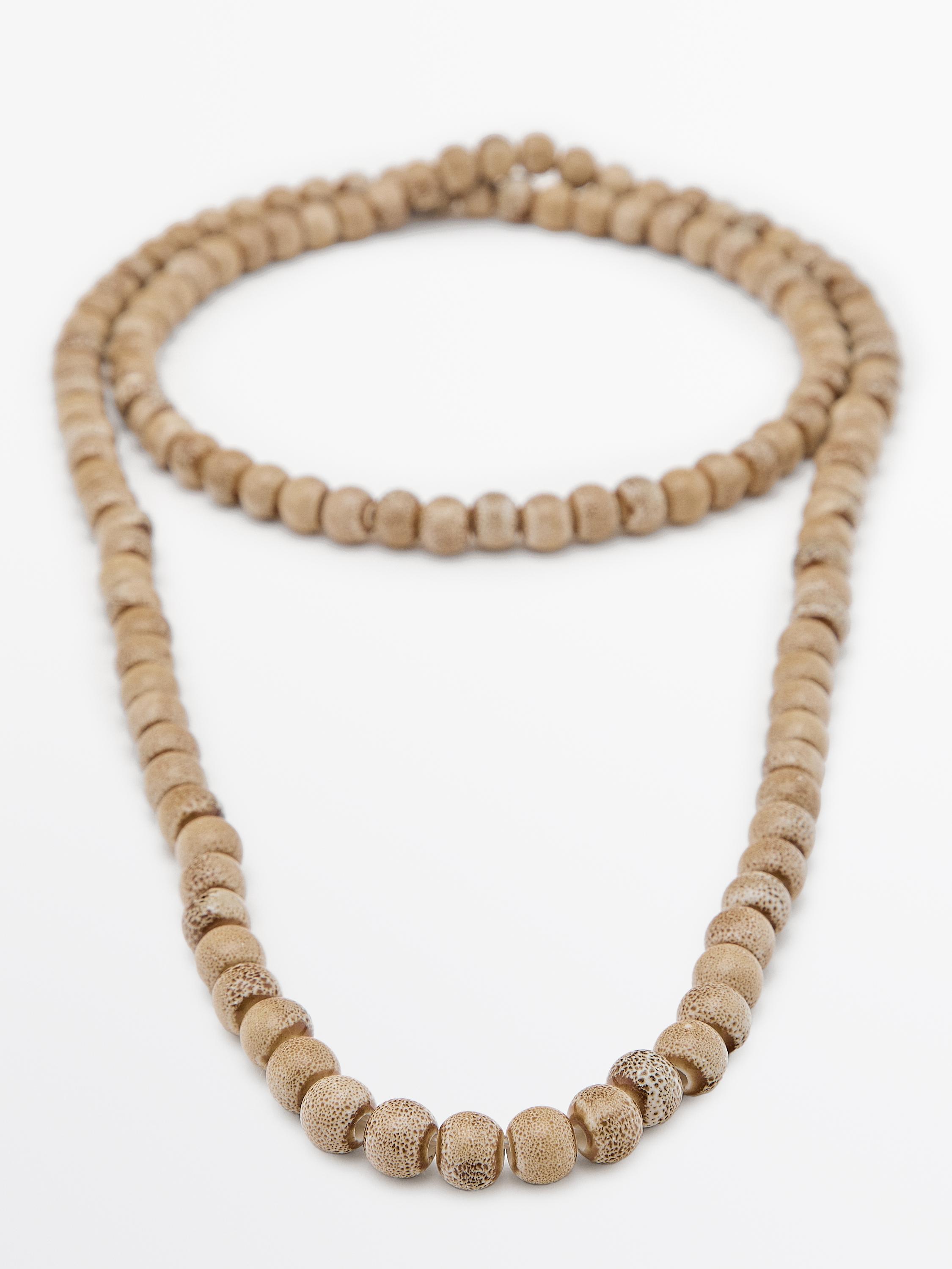 Collier de perles en céramique