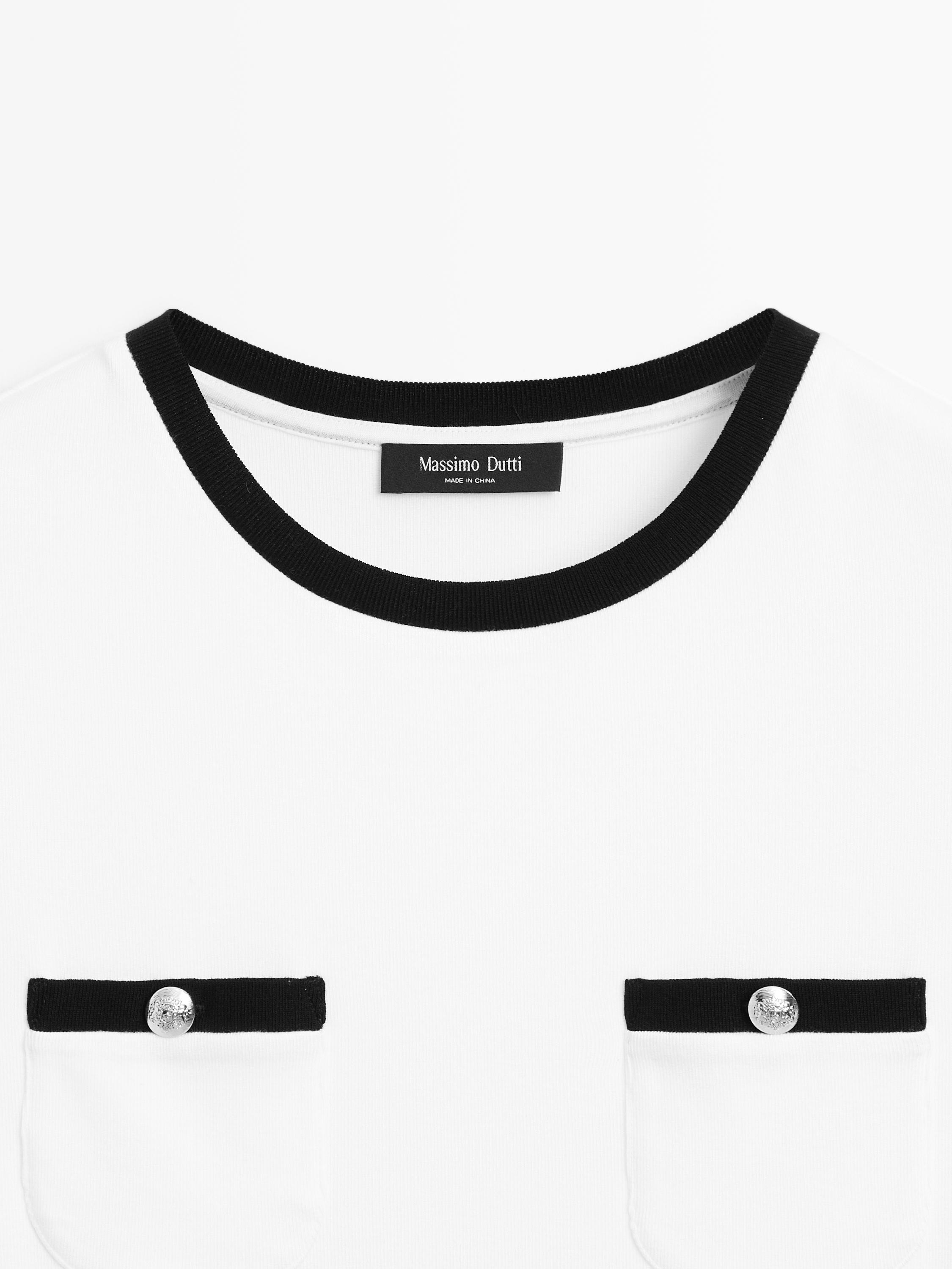Camiseta manga corta detalle bolsillos
