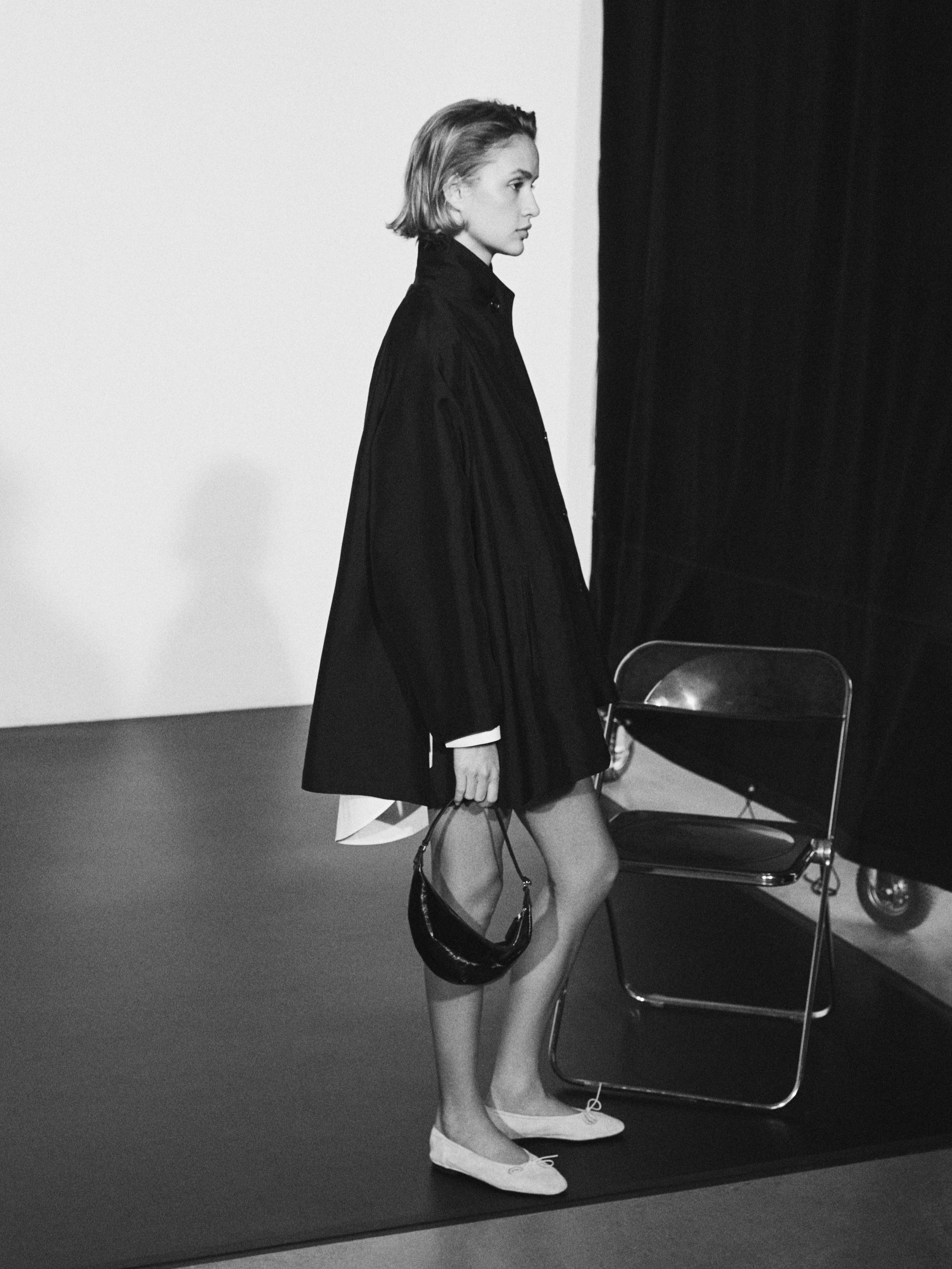 Flowing voluminous cape with button details — BLACK