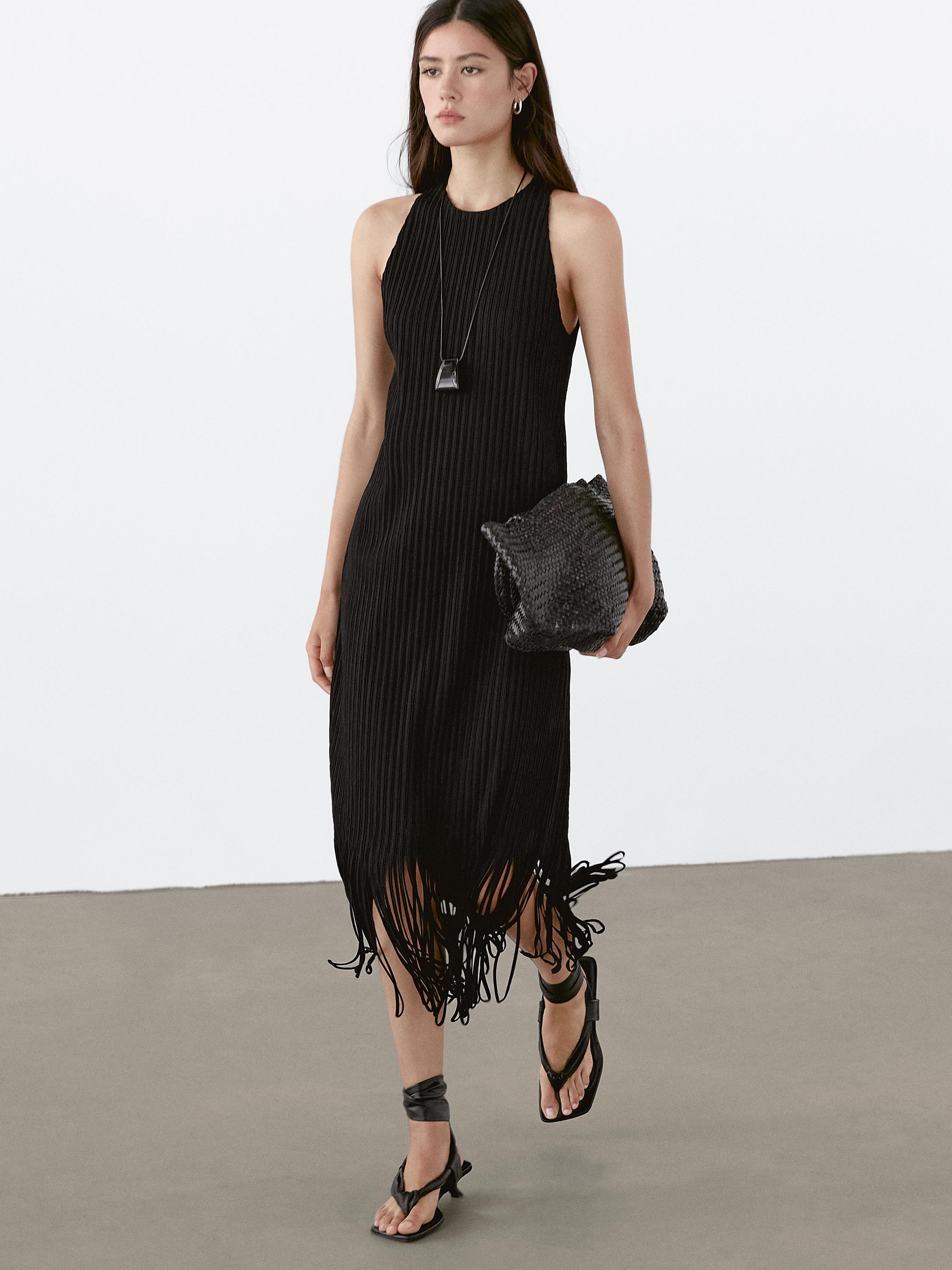 Textured knit dress with fringed hem