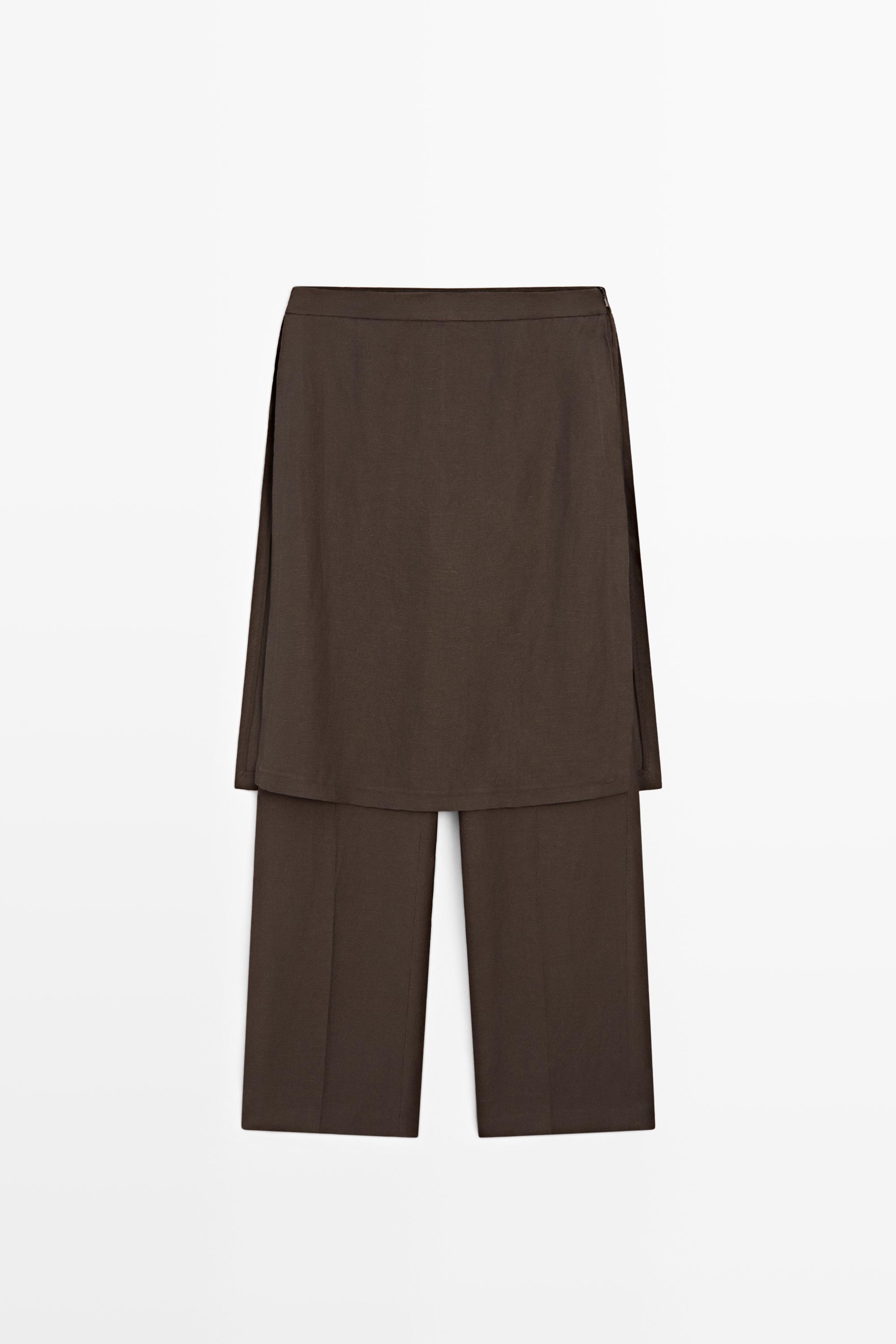 Flowing trousers with skirt detail