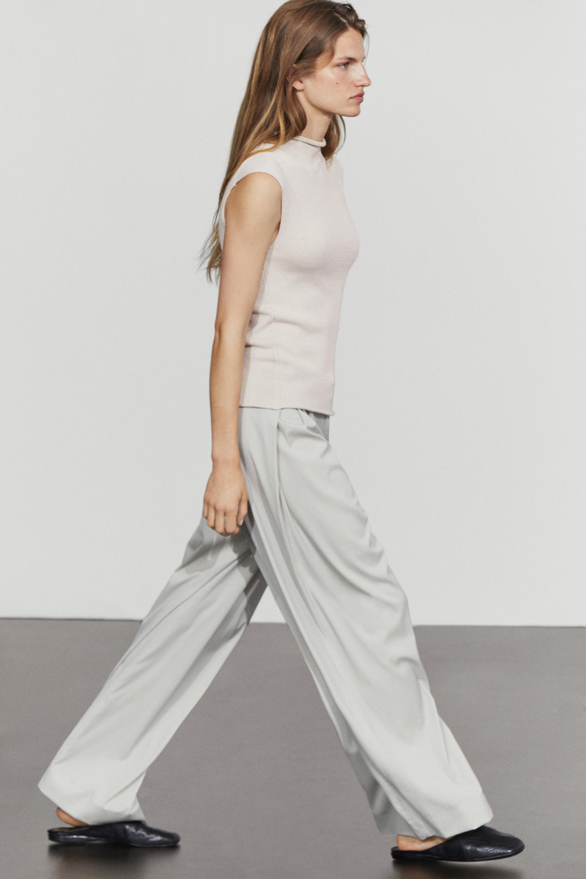 Cotton blend high neck knit top — STONE