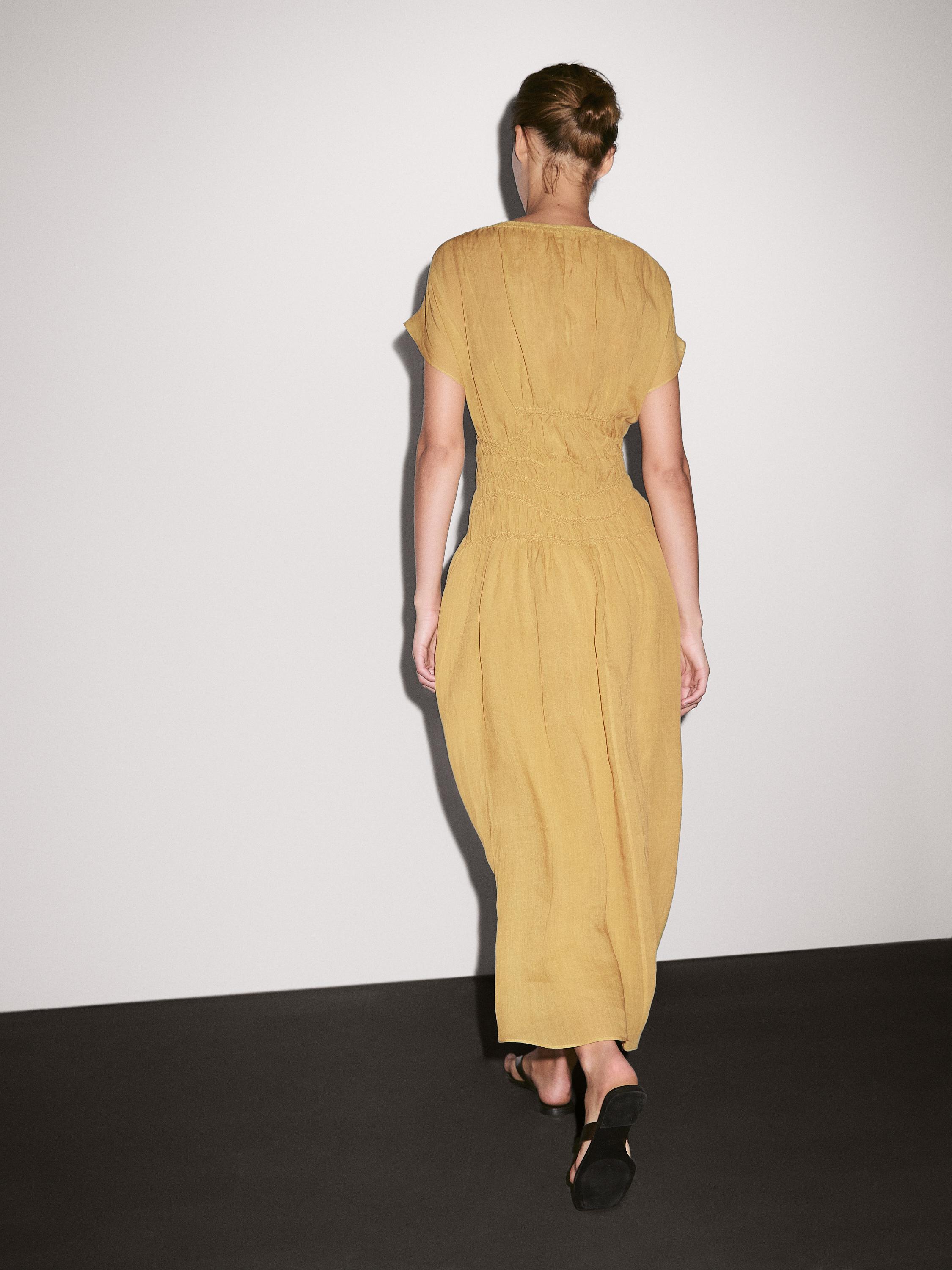 Midi dress with embroidered detail