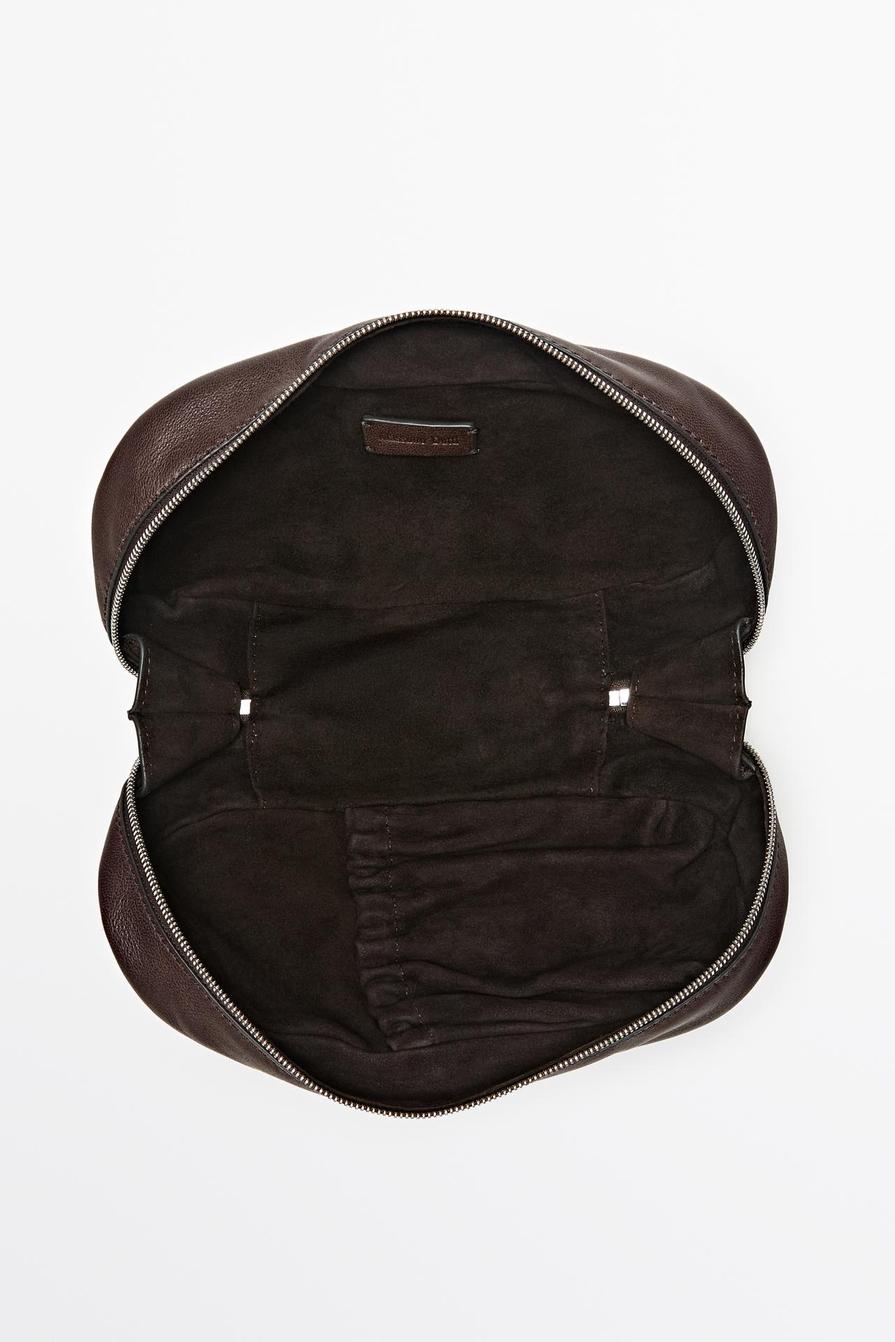 Nappa leather oval toiletry bag — BROWN